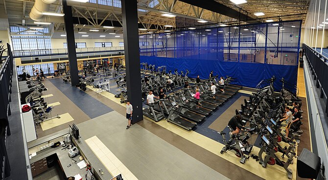 Team Fairchild members enjoy all the new equipment and space the new $18.8 million fitness center has to offer. The project took about a year to complete. (U.S. Air Force photo by Airman 1st Class Taylor Curry)