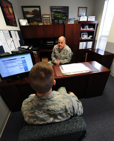 Master Sgt. Scott Woller, Airman & Family Readiness Center readiness NCO, discusses personal finances with an Airman Tuesday. Help with pesonal finaces is one of many services the A&FRC offers. (U.S. Air Force photo by Brian Bennett)