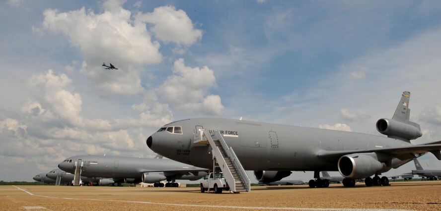 KC-10 Extenders sit on the flight line on Barksdale Air Force Base, La., March 28. The KC-10 is a tanker cargo aircraft designed to increase global mobility for U.S. aircraft through in-flight refueling. The tankers are visiting from Travis AFB, Calif. and McGuire AFB, N.J., to practice in-flight refueling with larger aircraft. (U.S. Air Force photo/Airman 1st Class Micaiah Anthony)(RELEASED)