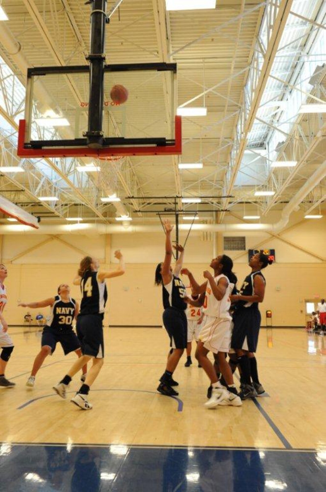 During the fourth day of the Women’s Armed Forces Basketball Championship, the Marines and the Navy faced-off. At half time the Navy was down by 17 with a score of 25. The Navy kept the lead and was the ultimate victors with a score of 89. The Marine’s final points totaled 62. (U.S Air Force photo by Chris Cokeing)