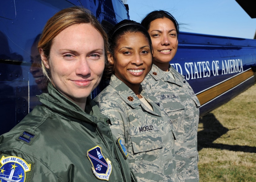 From left to right, Capt. Margaret McCord, 1st Helicopter Squadron pilot, Maj. Tammy Mosley, 779th Medical Operations Squadron nurse and Maj. Jacqueline Jackson, 579th Medical Group flight nurse, proudly represent Joint Base Andrews at the Women of Aviation Worldwide Week’s Fly it Forward Day in Frederick, Md. on March 10. Giving Jackson an incentive flight on her birthday, McCord flew the UH-1N Iroquois to an air show where the women met up with Mosley and together enlightened local community members of the Andrews mission. (U.S. Air Force photo/Senior Airman Laura Turner)