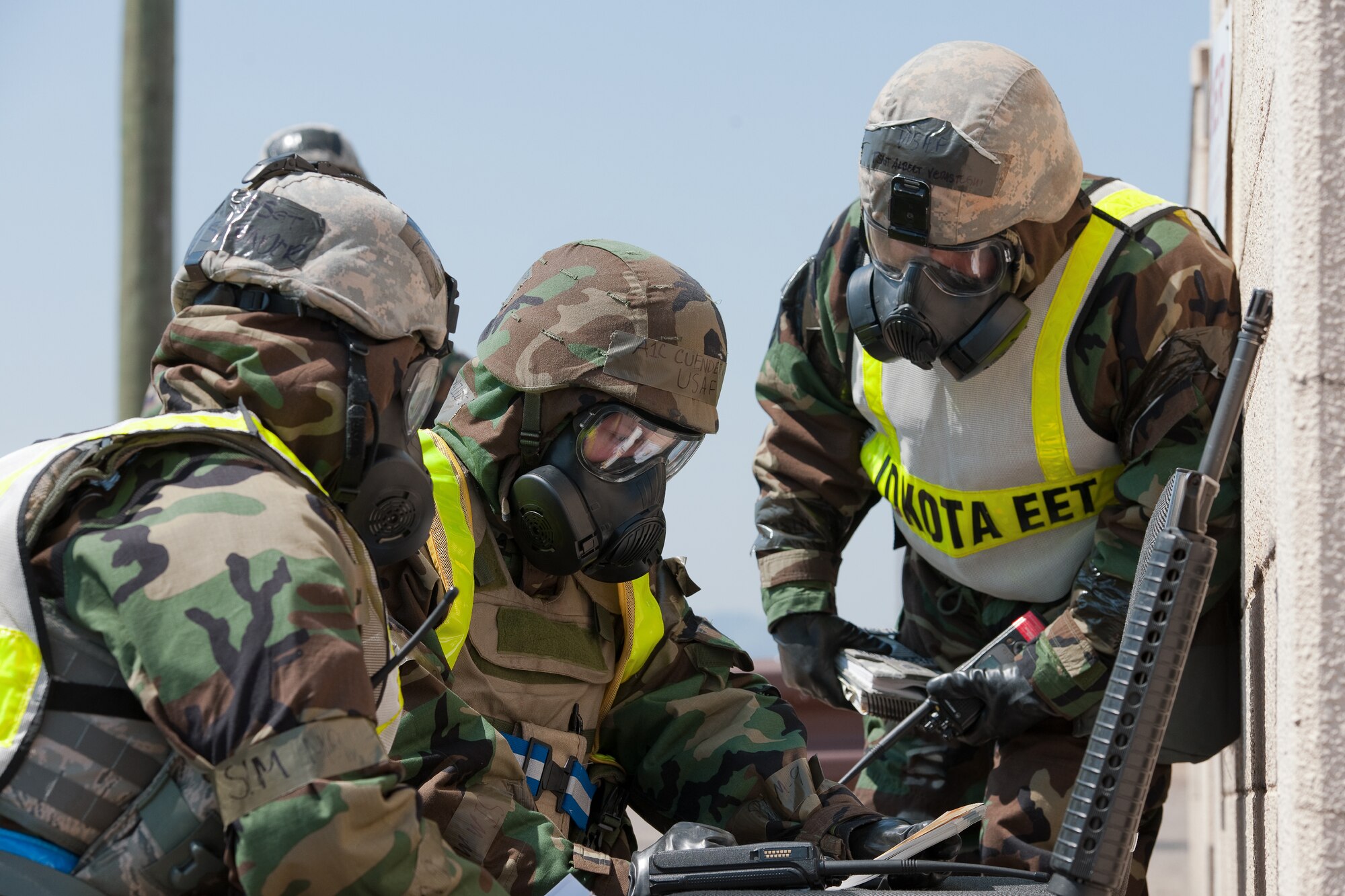 YOKOTA AIR BASE, Japan -- Airman 1st Class Phillip Cuendent (center), 374th Security Forces augmentee, gives answers to the 374th Security Forces Squadron exercise evaluation team during an operation readiness exercise at Yokota Air Base, Japan, March 27, 2012. (U.S. Air Force photo/Osakabe Yasuo)