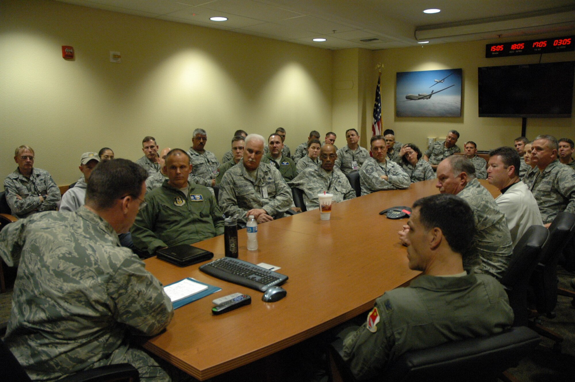 940th Wing Commander, Colonel Kevin Cavanagh, meets with members of the 13th Reconnaissance Squadron moments after Air Force officials released the Force Structure Announcement, March 6, 2012.  Initially, the 940th Wing was slated to gain two members in the coming fiscal year.  Since, however, the 13 RS has learned it will face possible deactivation and reallocation of the squadron’s 196 members, adding to Beale’s projected loss of 897 active duty, Guard and civilian members identified in the March 6 announcement. (U.S. Air Force photo/Dana Lineback)