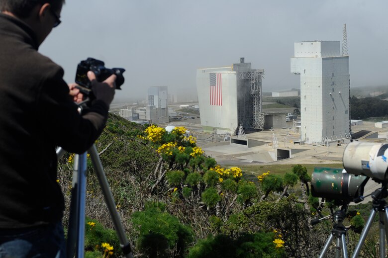 VANDENBERG AIR FORCE BASE, Calif. -- Ben Cooper, Spaceflight Now website photographer, sets up a remote camera near Space Launch Complex six for a luanch here March 29, 2012. The United Launch Alliance Delta IV Medium rocket launch is scheduled for April 2, 2012. (U.S. Air Force photo/Staff Sgt. Andrew Satran) 
