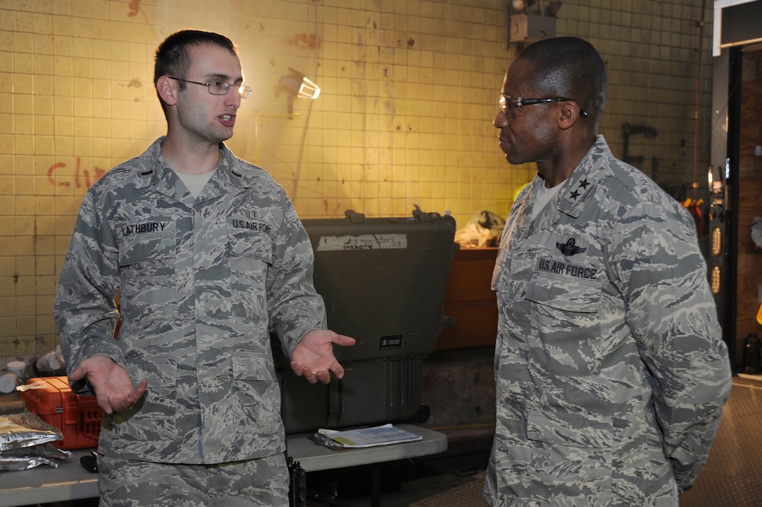 Air Force District of Washington Commander Maj. Gen. Darren W. McDew is briefed on Black Flag Exercise operations March 28 at the Center for National Response in Gallagher W.Va. McDew asked questions and interacted with the Airmen to see how this exercise will prepare them for real world disasters. (U.S. Air Force photo by Staff Sgt. Christopher Ruano)