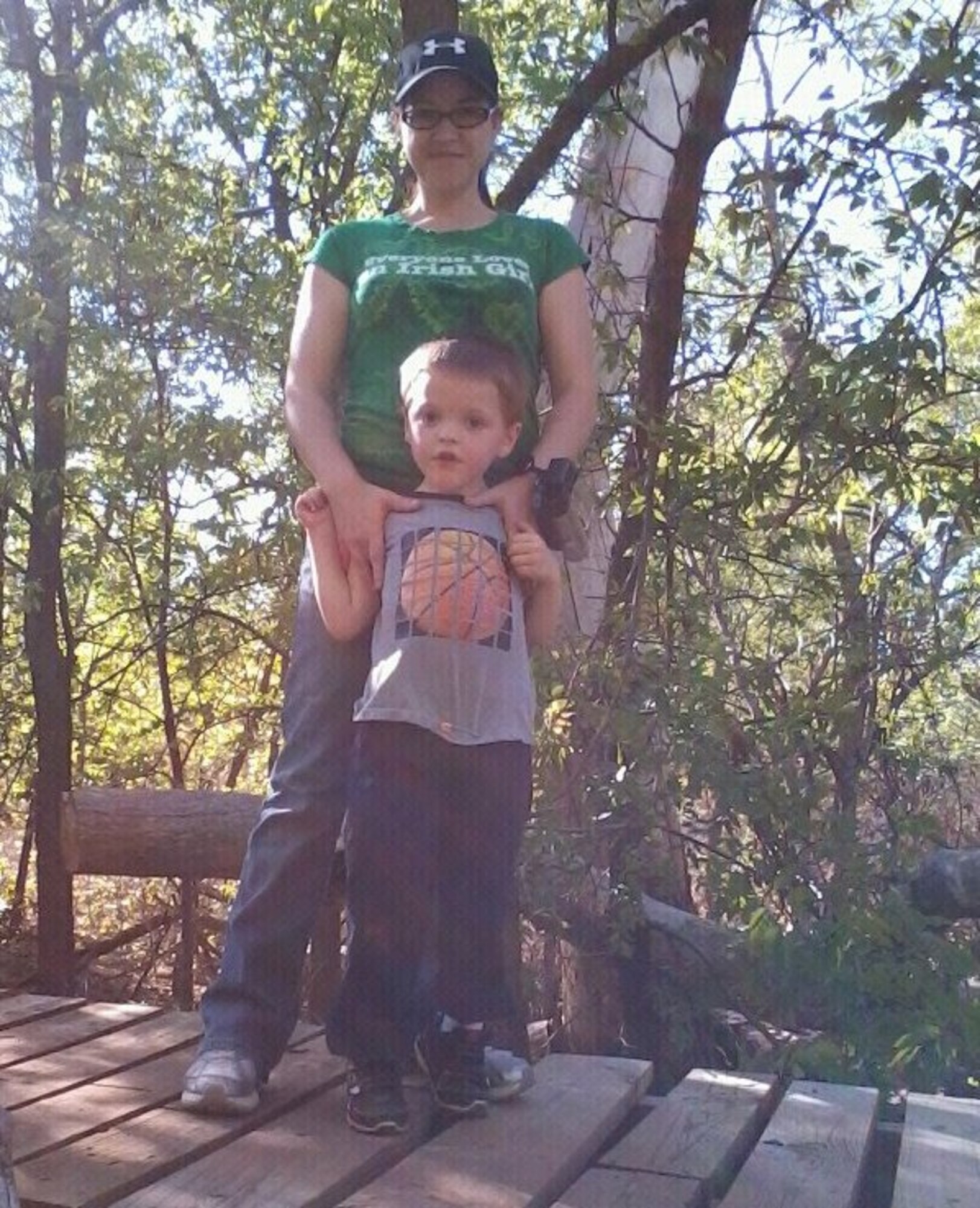 Jessica McLain, wife of Staff Sgt. Sean McLain, with their son Dylan at a park in this undated photo.  McLain, a maintenance instructor with the 363rd Training Squadron at Sheppard Air Force Base, and his family are one of the many Air Force families who have benefitted from the assistance of the revamped Exceptional Family Member Program.  (U.S. Air Force courtesy photo)