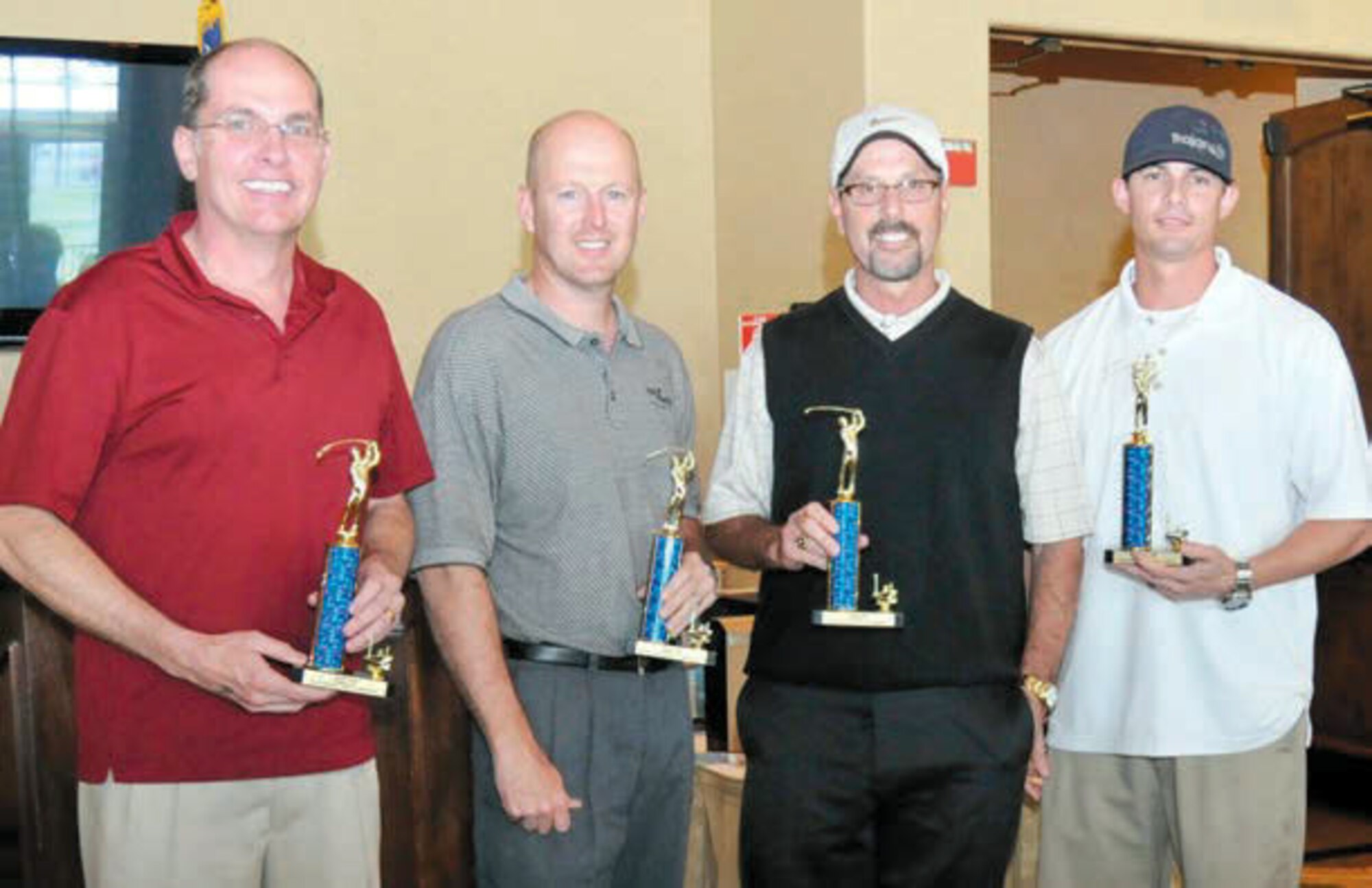 KimChief Master Sgt. Jim Blucher, Master Sgt. Don Lazenby, Cary Kerr and Maj. Casey Thompson were the winning team at the March Field 16th Annual Inter-Services Golf Tournament March 12 at Soboba Springs Country Club, San Jacinto. Blucher, La-zenby and Thompson are assigned to the 196th Reconnaissance Squadron and Kerr is with the 452d Force Support Squadron. (U.S. Air Force photo by Henry Kim)