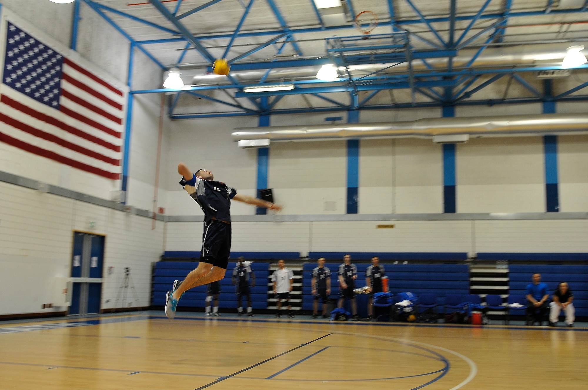 ROYAL AIR FORCE LAKENHEATH, England -- 1st Lt. Ty McKeever, Shaw Air Base S.C., U.S. Air Forces in Europe men's team, serves the ball during the Headquarters Allied Air Component Ramstein Volleyball Championship Tournament at the RAF Lakenheath Fitness Center March 27, 2012.  The aim of the tournament is to encourage and assist the promotion of inter-nation sporting activities among NATO Allied Air Command teams.  The U.S. men's team won third place in the competition.  (U.S. Air Force photo by Staff Sgt. Connor Estes)