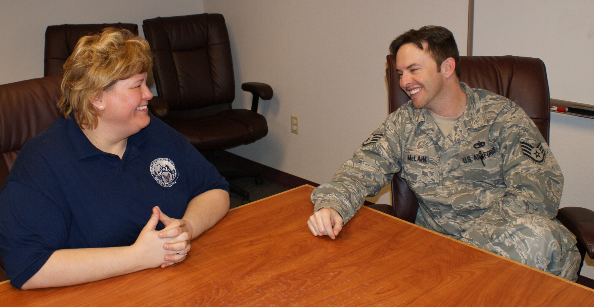 Anna Dumont, base Exceptional Family Member Program Family Support Coordinator, discuss autism programs with Staff Sgt. Sean McLain, a maintenance instructor with the 363rd Training Support Squadron, at the Airman & Family Readiness Center on Mar. 28, 2012 at Sheppard Air Force Base, Texas.  April is Autism Awareness Month and Dumont is in charge of assisting families in the EFMP with a broad range of services including referral, permanent change of station moves, counseling and community outreach. (U.S. Air Force photo/Dan Hawkins)