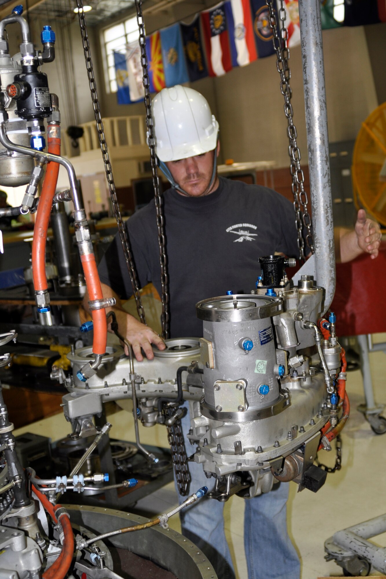 Nick Nolte, a jet mechanic and Air Reserve Technician assigned to the 917th Fighter Group, prepares a TF-34-100A gearbox for installation at the 917th Propulsion Shop on Barksdale Air Force Base, La., March 15, 2012. Nolte is a staff sergeant in the Air Force Reserve and is part of a team rebuilding the TF34-100A engine, which is used on A-10 Thunderbolt II jet aircraft. Personnel at the engine shop rebuilt more than 32 engines last year. (U.S. Air Force photo by Master Sgt. Jeff Walston) 