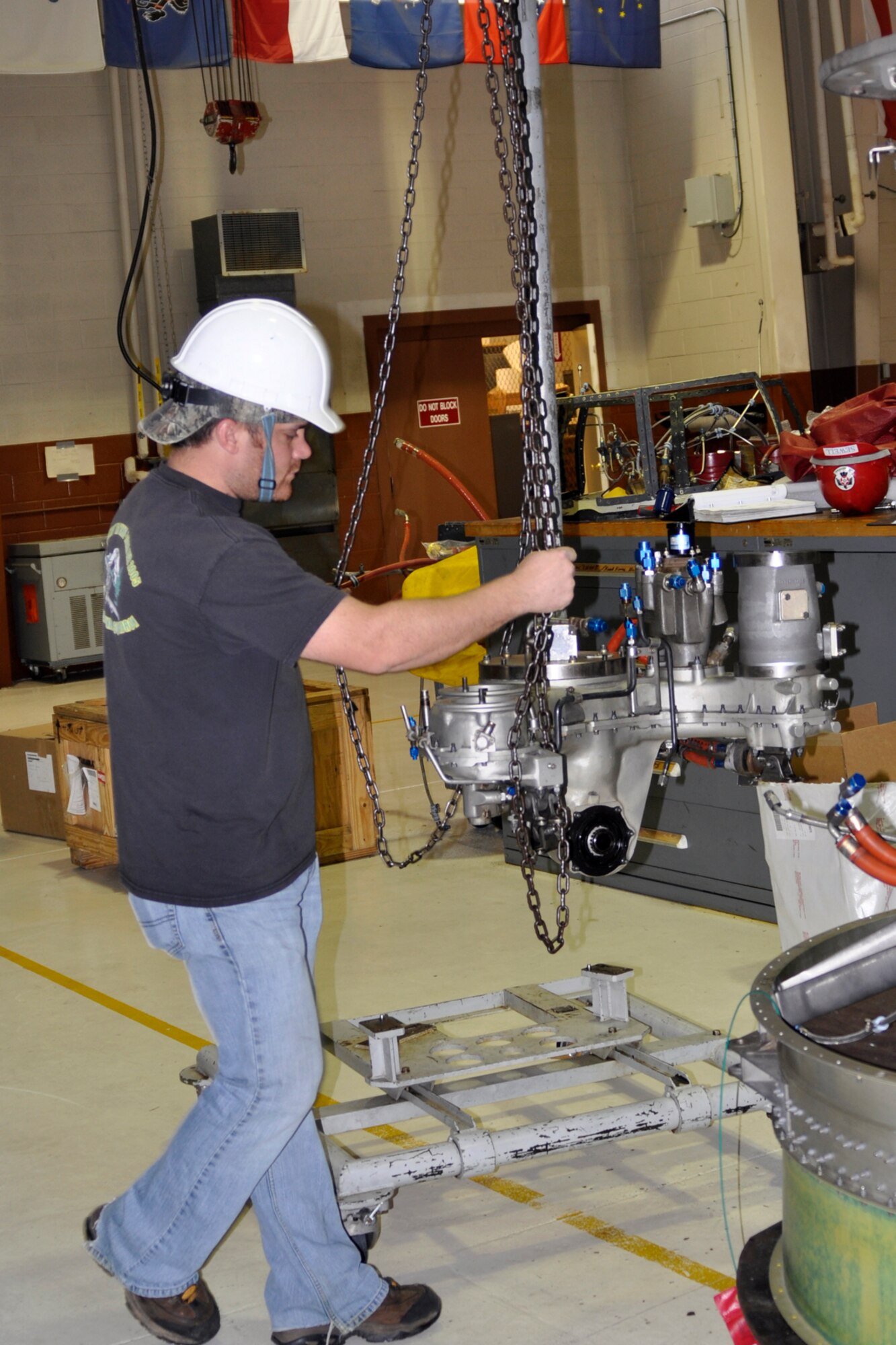 Nick Nolte, a jet mechanic and Air Reserve Technician assigned to the 917th Fighter Group, installs a TF-34-100A gearbox at the 917th Propulsion Shop on Barksdale Air Force Base, La., March 15, 2012. Nolte is a staff sergeant in the Air Force Reserve and is part of a team rebuilding the TF34-100A engine, which is used on A-10 Thunderbolt II jet aircraft. Personnel at the engine shop rebuilt more than 32 engines last year. (U.S. Air Force photo by Master Sgt. Jeff Walston) 