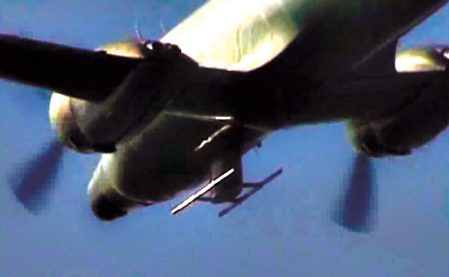 A flight-worthy Very High Frequency (VHF) Synthetic Aperture Radar (SAR) antennas was tested on a C-131 Aircraft.  An Aerodynamic North Atlantic Treaty Organization (NATO) mount supports twin broadband Very High Frequency dipoles. (Air Force Image)