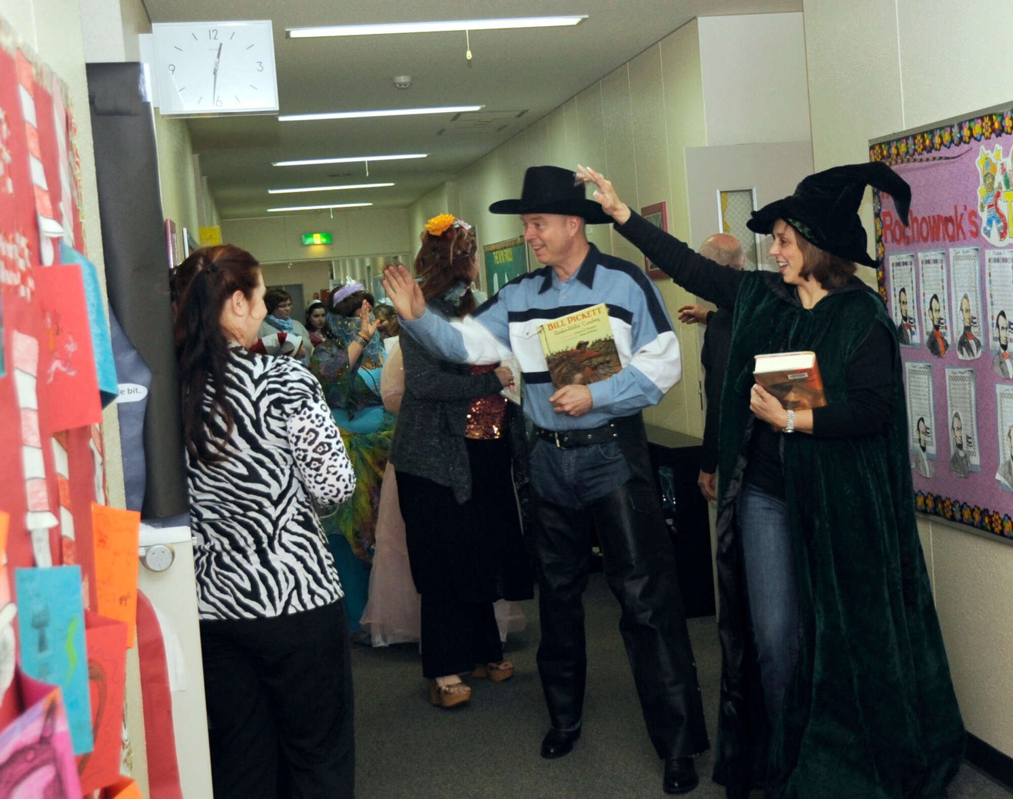 U.S. Air Force Col. Al Wimmer, 35th Fighter Wing vice commander, leads the Book Character parade at Cummings Elementary School on Misawa Air Base, Japan, March 28, 2012. During Wacky Wednesday students at Cummings Elementary School dressed up to portray book characters as part of the school's Read Across America program. (U.S. Air Force photo by Airman 1st Class Kaleb Snay/Released)