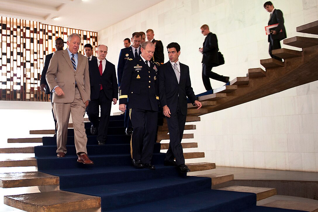 U.S. Army Gen. Martin E. Dempsey, chairman of the Joint Chiefs of Staff, center, and U.S. Ambassador to Brazil Thomas A. Shannon, left, walk to bi-lateral meetings between U.S. and Brazilian leaders in Brasilia, Brazil, March 29, 2012. 