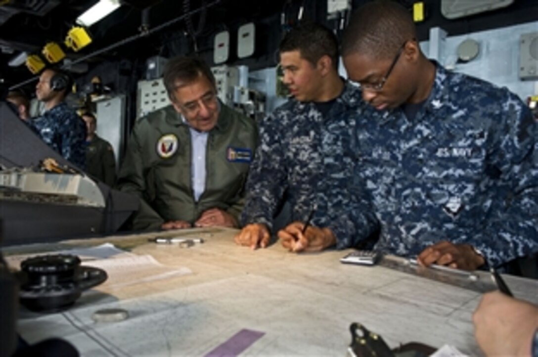Defense Secretary Leon E. Panetta visits sailors on the bridge of the USS Peleliu in the Pacific Ocean off the coast of San Diego, March 30, 2012. The secretary visited several areas on board the ship as well as also viewing flight operations on deck. 