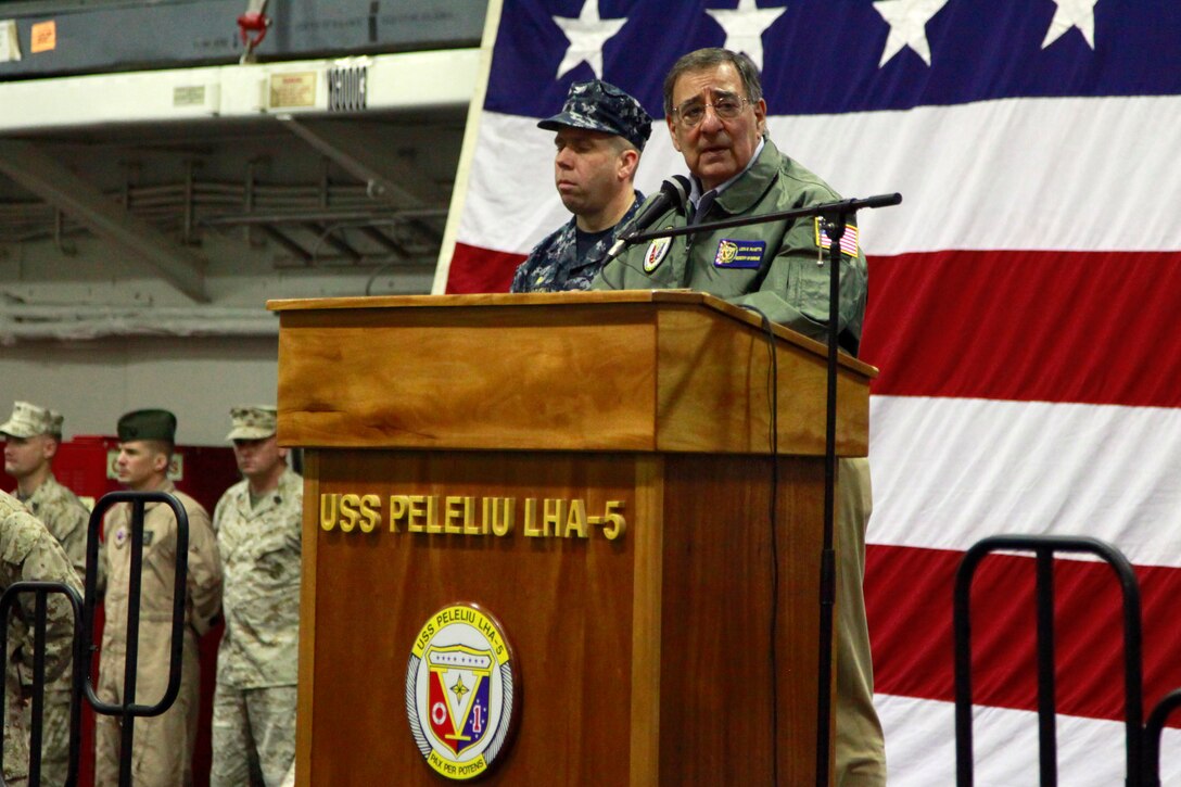 Secretary of Defense Leon Panetta speaks to service members from the 15th Marine Expeditionary Unit and the USS Peleliu, today. During his visit, Panetta toured the ship, had lunch with Marines and sailors, pinned awards on several service members, and held a brief press conference with the media. Panetta came to visit the Marines and sailors to reinforce his commitment to maintaining an expeditionary fighting force.::r::::n::::r::::n::