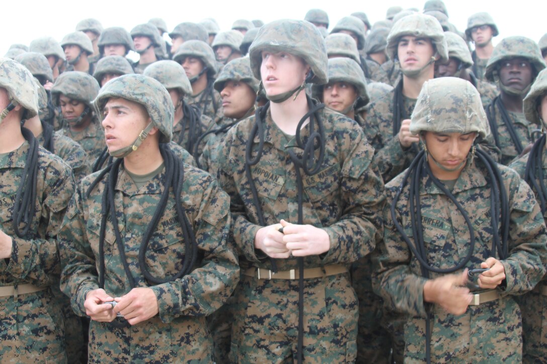 Recruits from Company C, 2nd Recruit Training Battalion, listen and apply what their instructor tells them to do with their gear March 30 aboard Marine Corps Recruit Depot San Diego. Co. C went through a series of classes early in the morning to help prepare them on the knowledge they needed to rappel and fast rope.