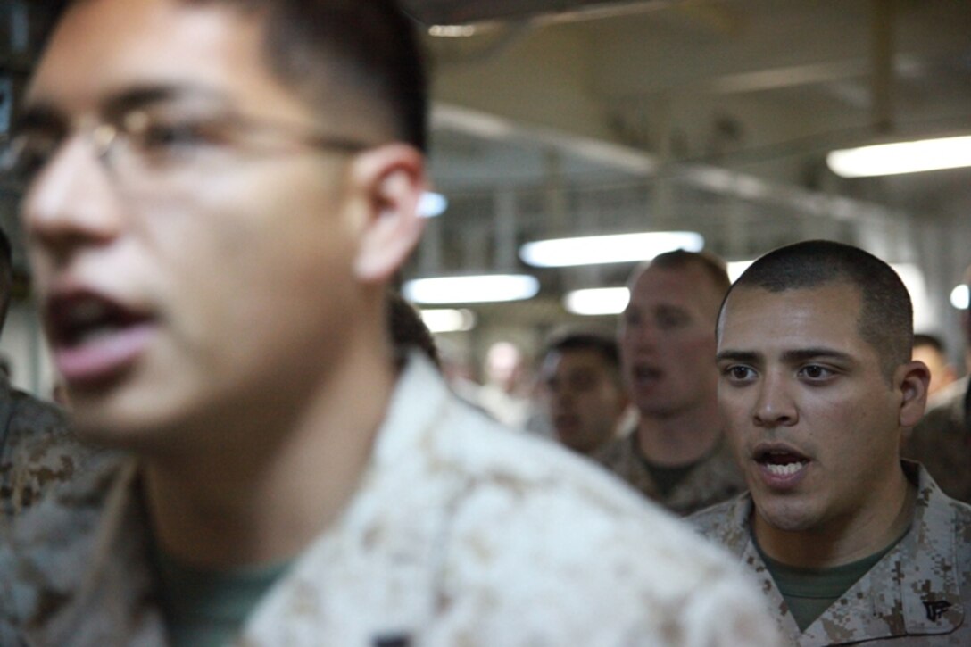 Recruits from Co. C apply what their instructors have told them as they begin to rappel on the depot's 60-foot tower.