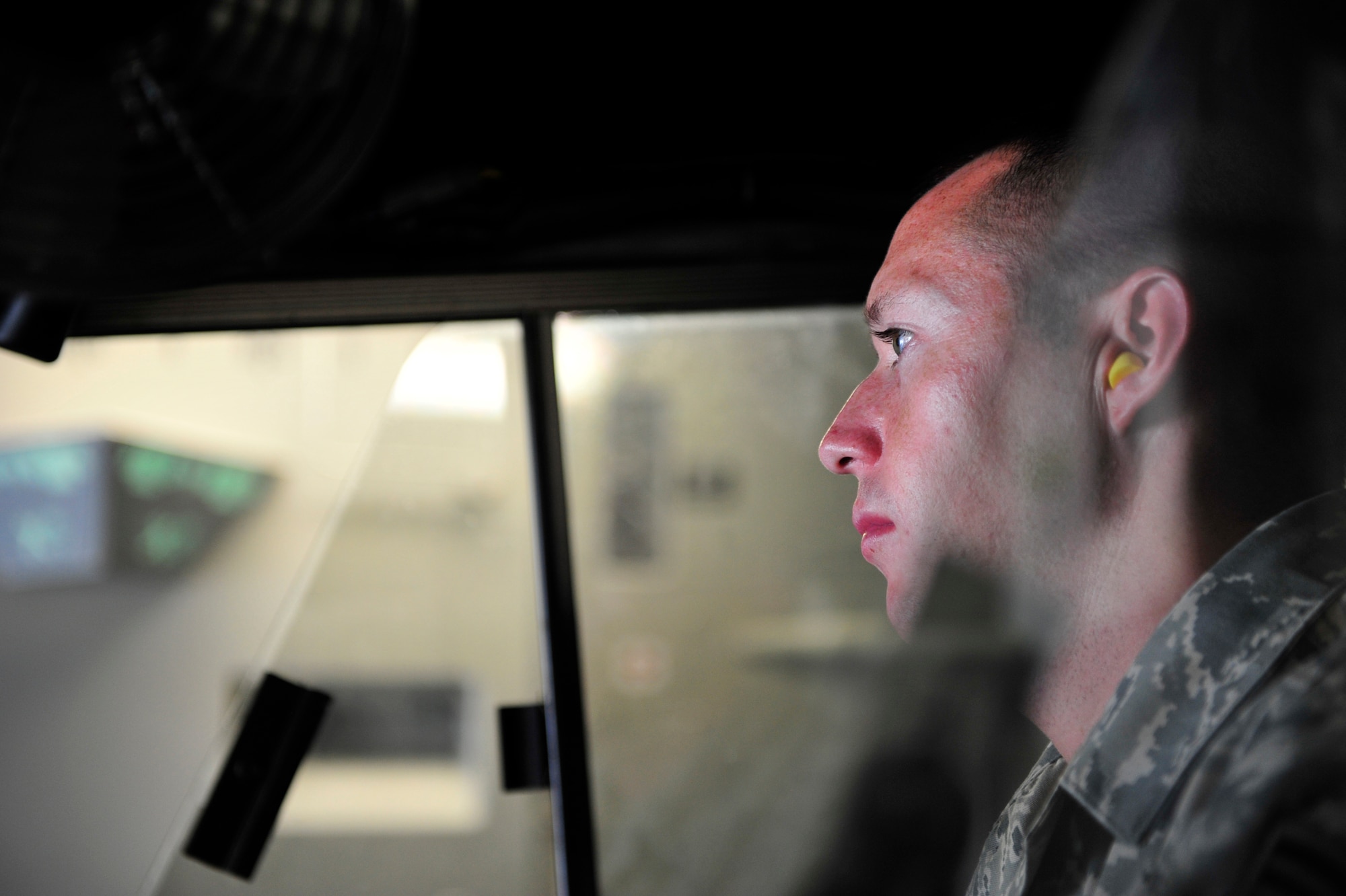 SYDNEY, Nova Scotia -- Senior Airman James Weimer, an air transportation journeyman assigned to the 621st Contingency Response Wing at Joint Base McGuire-Dix-Lakehurst, N.J., drives a next generation small loader from a 305th Air Mobility Wing C-17 Globemaster III here, April 26.  The JB MDL-based team was transporting a team of Sailors from the U.S. Navy’s Explosive Ordinance Disposal Mobile Unit 12 to participate in Exercise Ardent Sentry 2012, a major NORAD and U.S Northern Command exercise focused on defense support to civil authorities. (U.S. Air Force photo by Tech. Sgt. Parker Gyokeres) (Released)