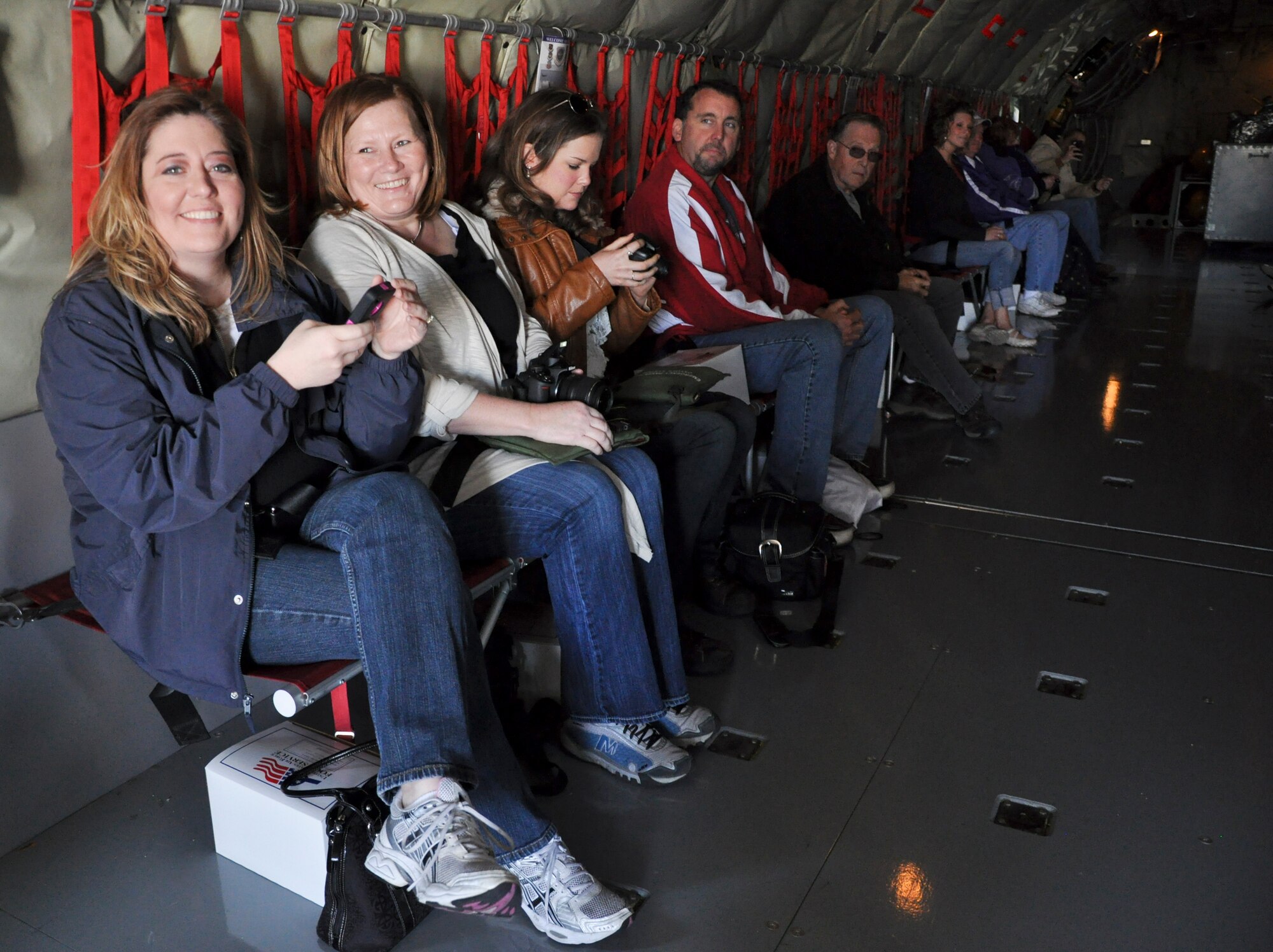 Teachers from Wichita, Kan., area schools prepare for an orientation flight on a KC-135 Stratotanker April 28, 2012, McConnell Air Force Base, Kan. The orientation flight was designed to familiarize the teachers with information about the 22nd Air Refueling Wing mission and the Air Force. (U. S. Air Force photo/ 2 Lt. Jessica Brown)