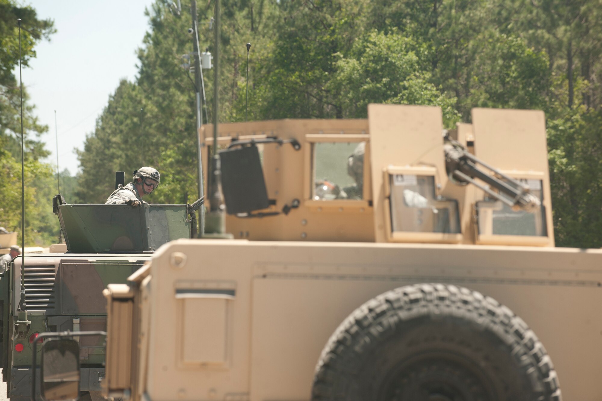 U.S. Air Force Airmen from the 820th Base Defense Group observe and ensure their convoy isn’t being followed during the 820th BDG operational readiness exercise at Moody Air Force Base, Ga., April 26, 2012. The 820th BDG was assessed on combat scenarios involving security and their ability to react to improvised explosive devices. (U.S. Air Force photo by Airman 1st Class Paul Francis/Released)

