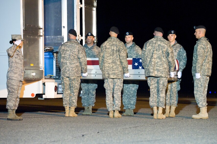 A U.S. Army carry team transfers the remains of Army Pfc. Christian R. Sannicolas of Anaheim, Calif, at Dover Air Force Base, Del., April 30, 2012. Sannicolas was assigned to the 1st Battalion, 504th Parachute Infantry Regiment, 1st Brigade Combat Team, 82nd Airborne Division, Fort Bragg, N.C. (U.S. Air Force photo/Adrian R. Rowan)