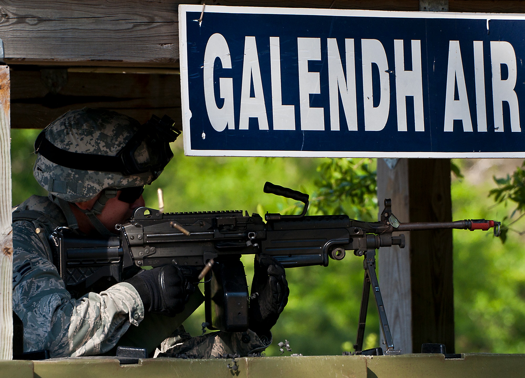 Airman 1st Class Ryan Moulton, of the 49th Security Forces Squadron, fires at enemies trying to gain entry into his air base during the three-day Brave Defender field training exercise April 28 at Eglin Air Force Base, Fla.  The exercise is the culmination of Air Force Materiel Command’s six-week security forces deployment training, administered by the 96th Ground Combat Training Squadron. GCTS instructors teach 10 training classes a year, which consists of improvised explosive device detection and reaction, operating in an urban environment, mission planning, land navigation, casualty care and more. More than 100 active-duty and National Guard Airmen attended this training. (U.S. Air Force photo/Samuel King Jr.)
