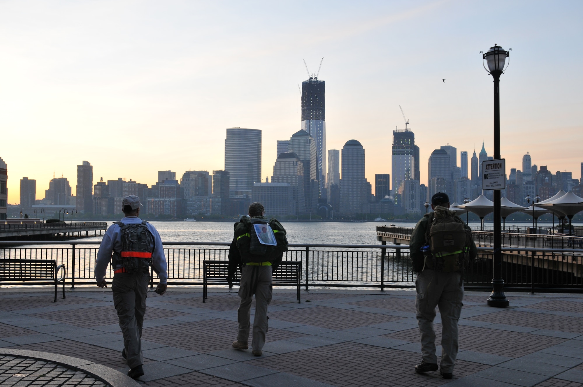 Team 1 of the Air Advisor Memorial Ruck March make their way to the new One World Trade Center in New York City on April 26, 2012. The One World Trade Center was the starting point of the ruck march, which was in honor of the nine air advisors who were killed April 27, 2011, in Kabul, Afghanistan. (U.S. Air Force photo/Tech. Sgt. Brian Christiansen)