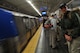 Col. Olaf Holm, the Air Advisor Academy commandant, waits to board the subway to transit to the new One World Trade Center in New York City on April 26, 2012. The One World Trade Center was the starting point of the Air Advisor Memorial Ruck March, a relay that spanned approximatley 90 miles from the in-construction structure to Joint Base McGuire-Dix-Lakhurst, N.J. The march, which took approximately 30 hours to complete, was in honor of the nine air advisors who were killed April 27, 2011, in Kabul, Afghanistan. (U.S. Air Force photo by Tech. Sgt. Brian E. Christiansen)