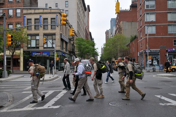 Team 1 makes their way thru New York City during the Air Advisor Memorial Ruck March, a 90-mile relay from the World Trade Center to Joint Base McGuire-Dix-Lakhurst, N.J., April 26, 2012. Each ruck team member carried a paver stone with a name of one of the nine who were killed April 27, 2011, in Kabul, Afghanistan. The stones were placed at the Air Advisor Memorial at JB McGuire at the end of the march April 27. (U.S. Air Force photo/Tech. Sgt. Brian E. Christiansen)