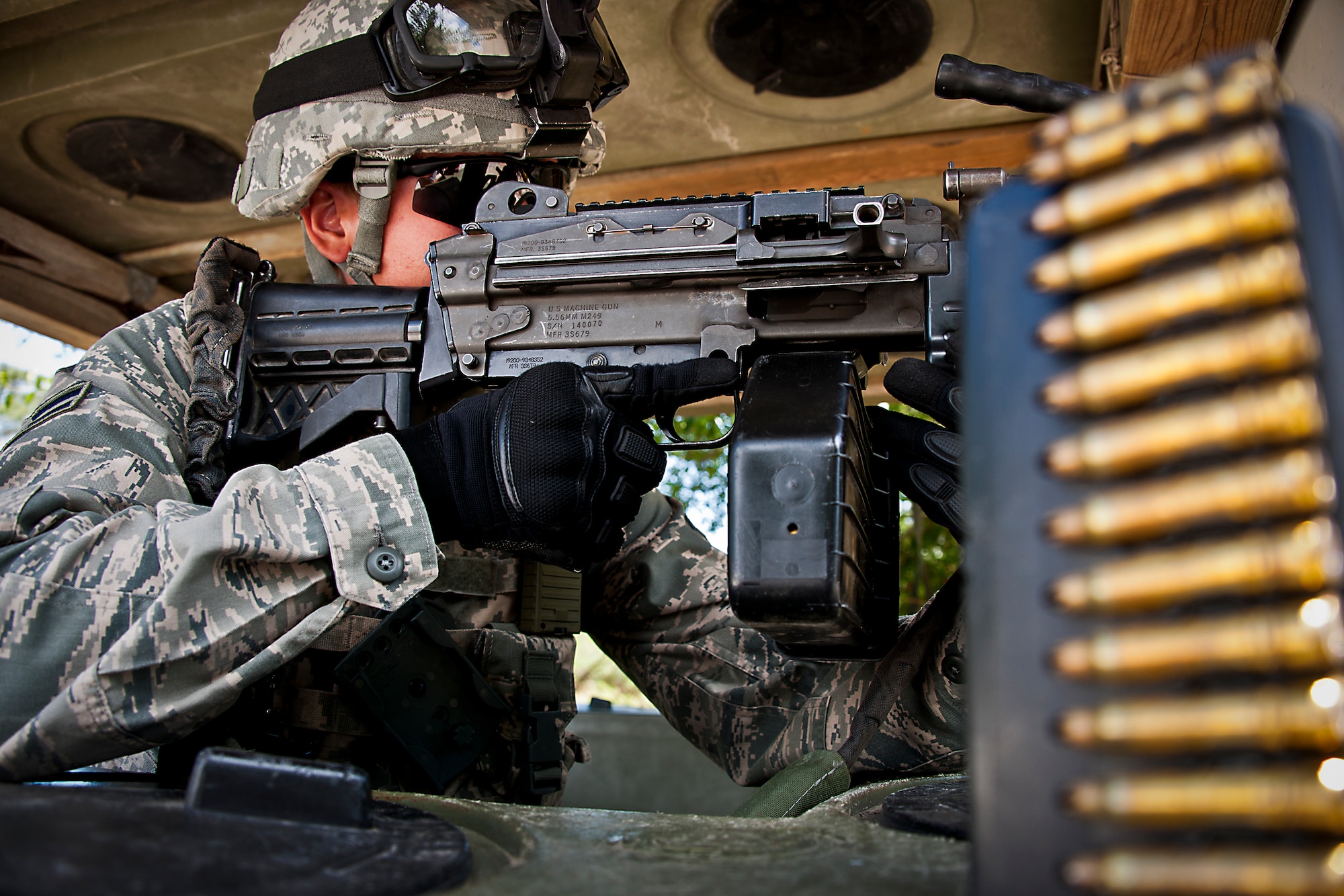 Airman 1st Class Ryan Moulton, of the 49th Security Forces Squadron, checks his field of fire from his camp’s entry control point at the three-day Brave Defender field training exercise April 28 at Eglin Air Force Base, Fla.  The exercise is the culmination of Air Force Materiel Command’s six-week security forces deployment training, administered by the 96th Ground Combat Training Squadron. GCTS instructors teach 10 training classes a year, which consists of improvised explosive device detection and reaction, operating in an urban environment, mission planning, land navigation, casualty care and more. More than 100 active-duty and National Guard Airmen attended this training. (U.S. Air Force photo/Samuel King Jr.)