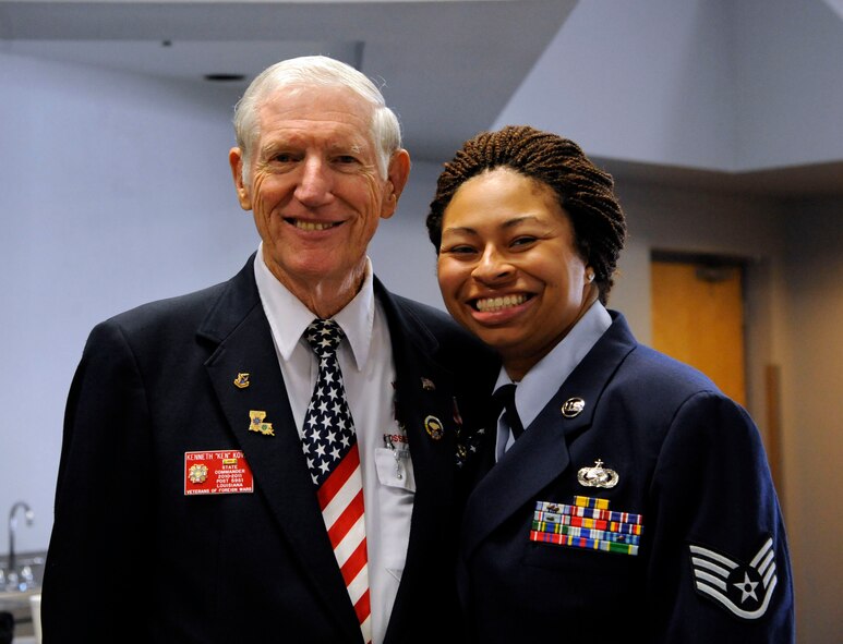 Staff Sgt. Saquenthia Barber, 2nd Logistics Readiness Squadron, and Kenneth Koval, the Louisiana Veterans of Foreign Wars commander, attend the 2012 Prisoner of War/Purple Heart Luncheon on Barksdale Air Force Base, La., April 27. The luncheon is held annually to honor veterans, in particular those who have been prisoners of war or have earned the Purple Heart decoration. (U.S. Air Force photo/Airman 1st Class Andrew Moua)(RELEASED)