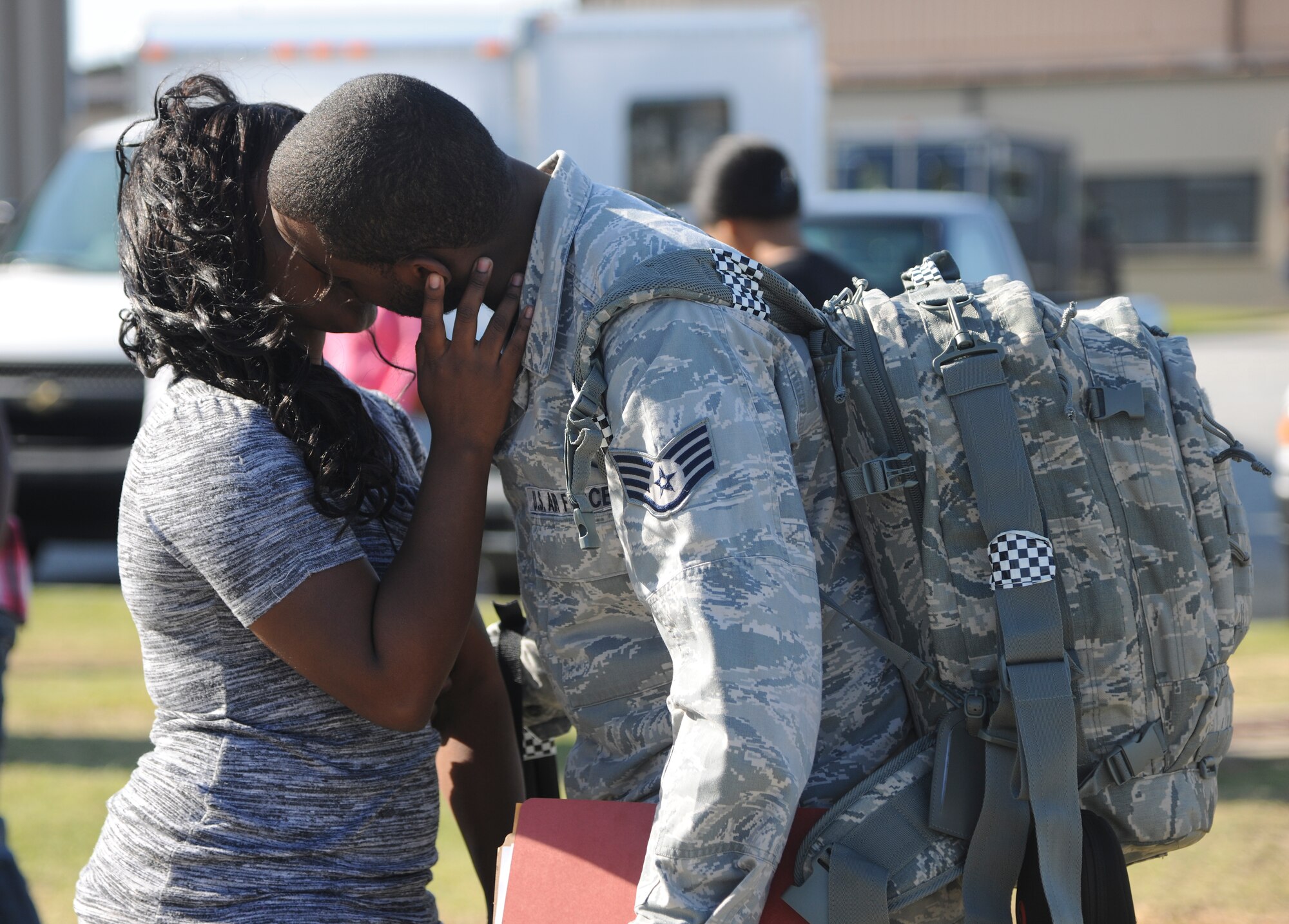 U.S. Air Force Staff Sgt. Brandon Hill, 23d Aircraft Maintenance Squadron crew chief, says goodbye to his girlfriend Sydney Morrison before departing from Moody Air Force Base Ga., April 22, 2012. Hill is deployed to Osan Air Base, Republic of Korea, to support A-10C Thunderbolt IIs as part of an air expeditionary team. (U.S. Air Force Photo by Airman 1st Class Paul Francis/Released)
