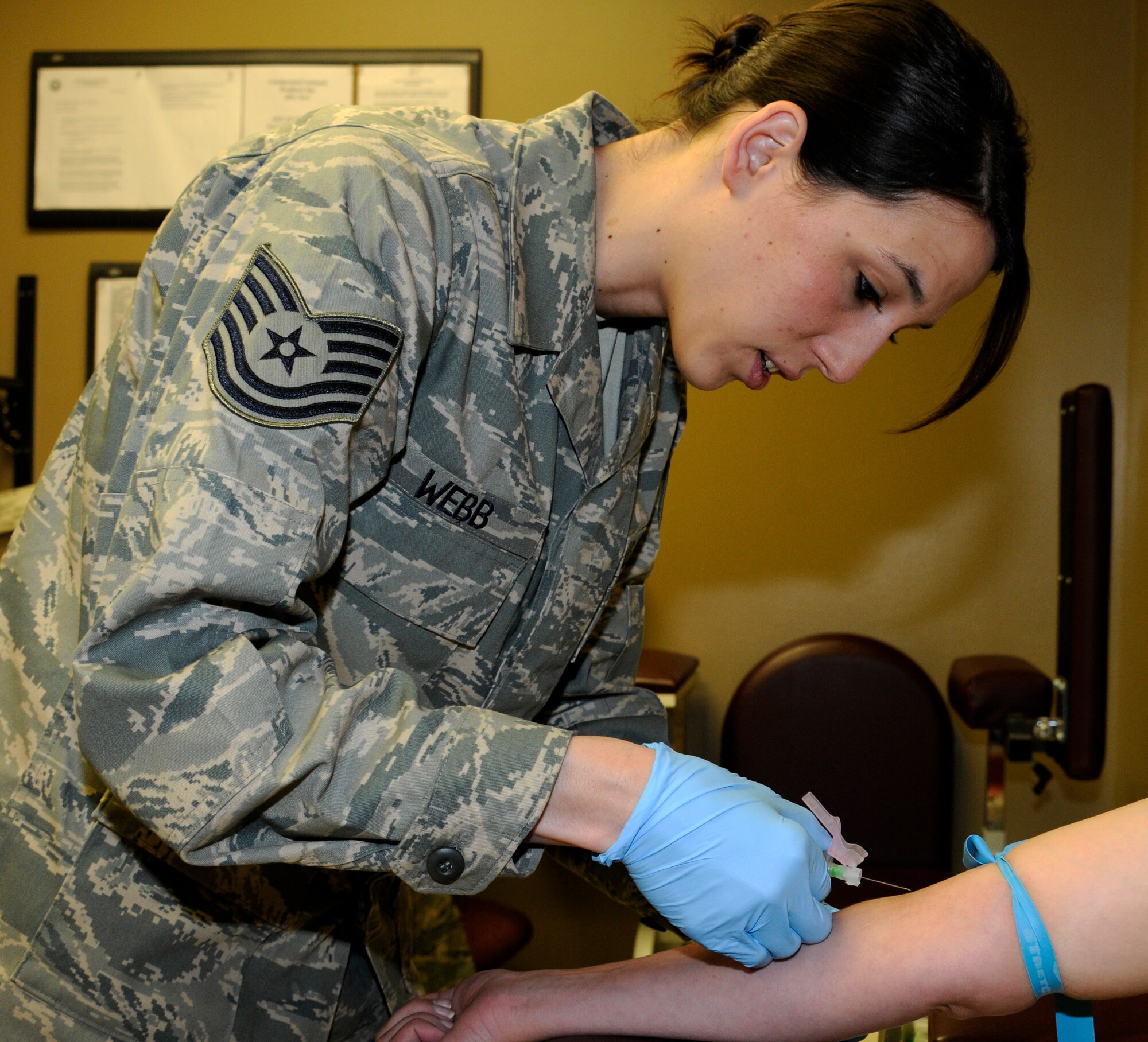 Tech Sgt. Mindy Webb, a member of the 188th Medical Group, was selected as the 188th Fighter Wing's Flying Razorback spotlight for May 2012. (National Guard photo by Airman 1st Class John Hillier/188th Fighter Wing Public Affairs)