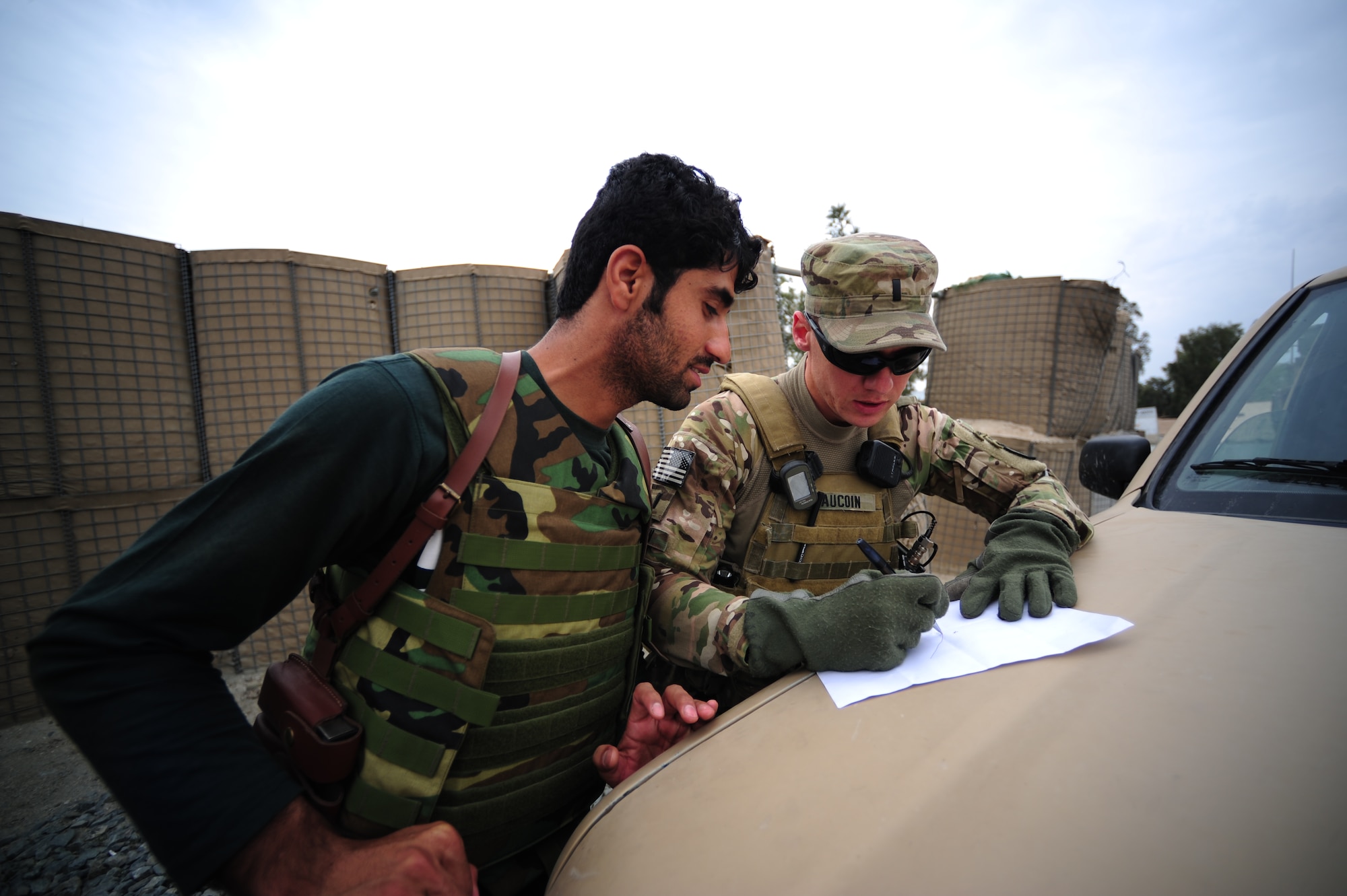U.S. Army 1st Lt. Jeremy Aucoin of Warwick, R.I., from 1st Platoon, 143rd Infantry Battalion (Airborne), Rhode Island National Guard, prepare for a joint mission with Afghan National Army soldiers in the Laghman Province, Afghanistan April 19, 2012. Aucoin is deployed to the Laghman Provincial Reconstruction Team, tasked to help increase local government infrastructure in the Laghman Province. (U.S. Air Force photo/Tech. Sgt. DeNoris A. Mickle)