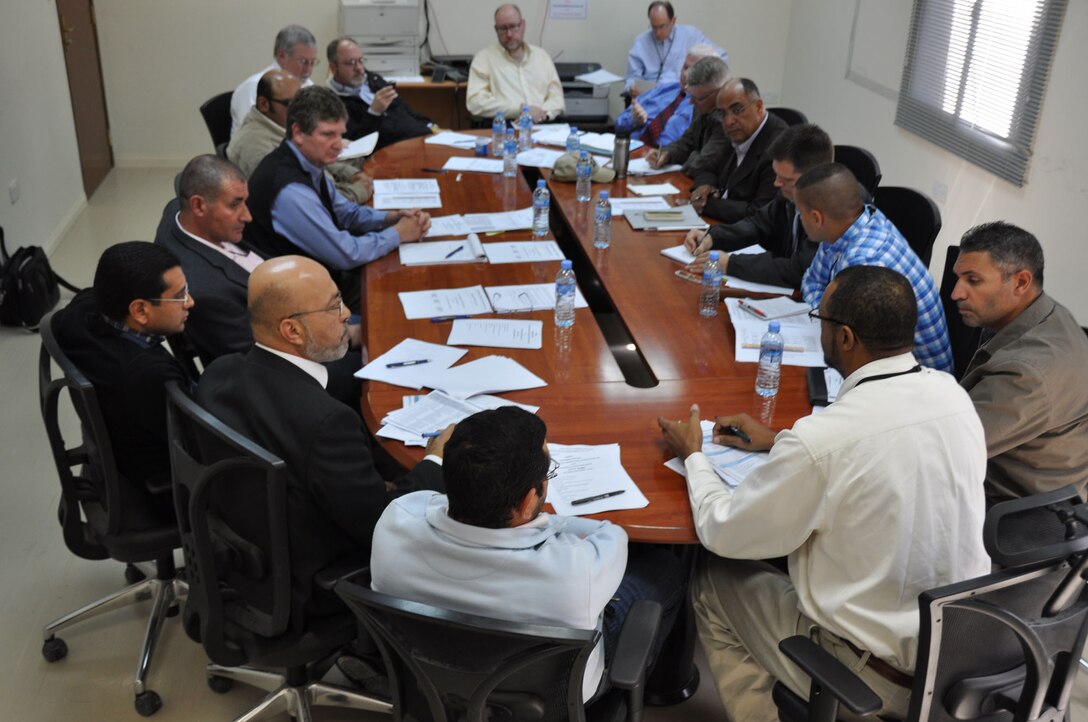QATAR — The U.S. Army Corps of Engineers Middle East District conducts partnering sessions with contractors to improve teamwork on construction sites. A session in Qatar focused on completion of a parking apron.