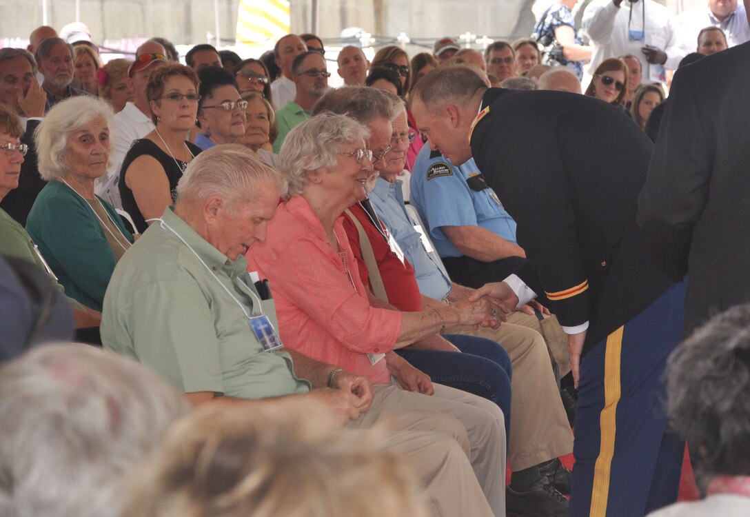 HARTWELL, Ga. — Col. Jeff Hall, Commander of the U.S. Army Corps of Engineers Savannah District, shakes hands with former Hartwell workers and their family members at the Hartwell 50th Anniversary Commemoration Ceremony, April 27, 2012.