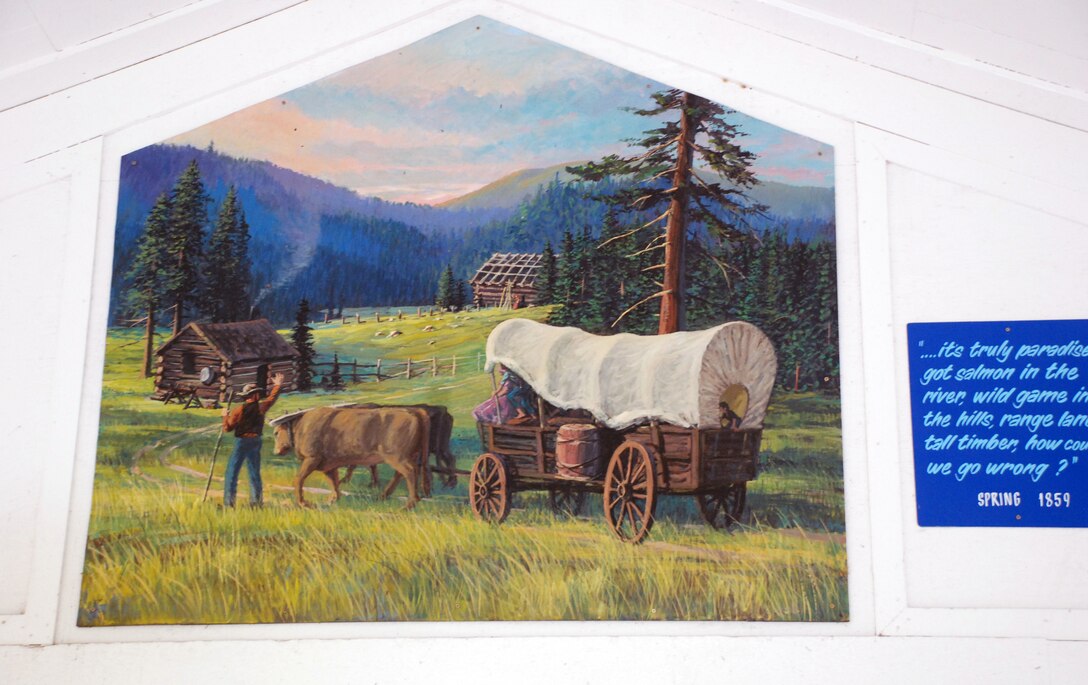 Painting of a settler and his covered wagon by Lee Jensen. Bonneville Lock and Dam is known for many things, like history and hydropower, but artwork? Lee Jensen, who worked there between 1991 and 2001, left his mark ... in a very creative way.