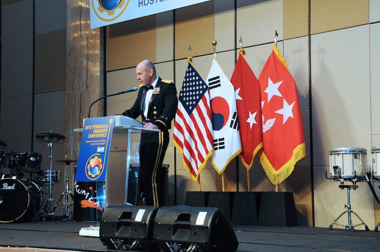 Maj. Gen. Dennis E. Jacobson, Assistant Chief of Staff for Transformation, U.S. Forces Korea, and Brig. Gen. Park Jong-gwan, Jacobson’s counterpart in the Republic of Korea Army, cut the cake at the Society of American Military Engineers Peninsula Engineer Conference Ice Breaker April 4.  