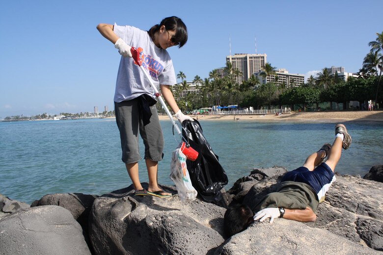 Students from the Punahou High School Junior ROTC program and Corps’ employees and family members joined forces to clean up the beach and berm area of the Corps’ Pacific Regional Visitor Center at Fort DeRussy as part of Honolulu’s Earth Day 2012 Mauka to Makai Clean Water Expo.  