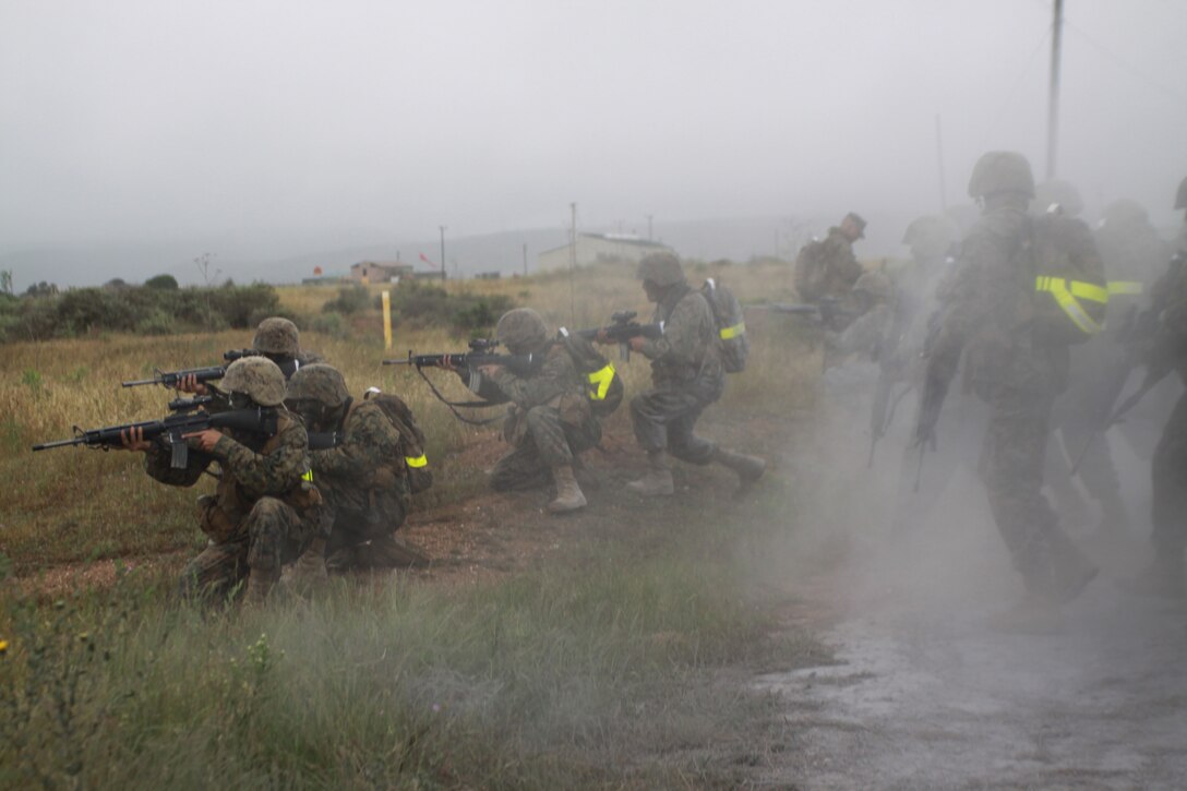 Company B secures the perimeter as a simulated Improvised Explosive Device goes off May 1 aboard Edson Range, Weapons Field Training Battalion, Marine Base Camp Pendelton. IED lane was one of the many obstacles Co. B overcame while at the Crucible. During the lane recruits had to patrol for possible simulated IED's.