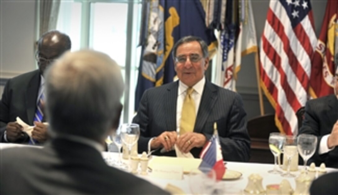 Secretary of Defense Leon E. Panetta talks with Philippines Secretary of National Defense Voltaire Gazmin before a dinner in Gazmin's honor in the Pentagon on April 30, 2012.  