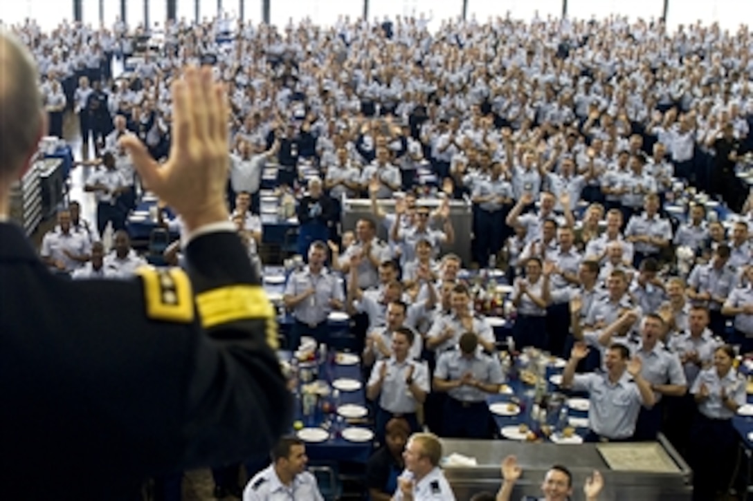Army Gen. Martin E. Dempsey, chairman of the Joint Chiefs of Staff, waves to Air Force cadets before lunch during his visit to the Air Force Academy in Colorado Springs, Colo., April 30, 2012. 