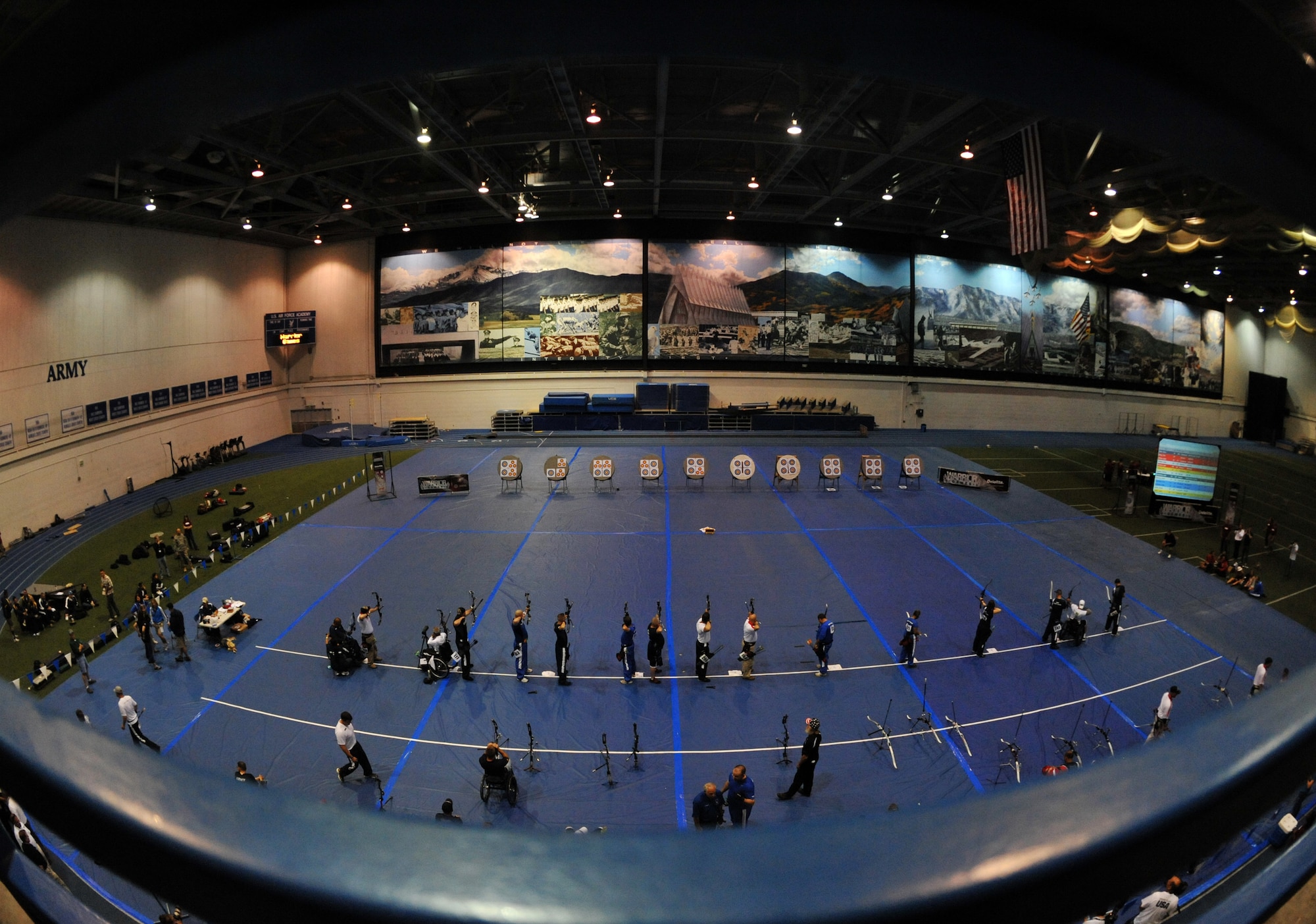 Athletes shoot their bows at targets during the archery competition of the 2012 Warrior Games at the U.S. Air Force Academy in Colorado Springs, Colo., May 2, 2012. (U.S. Air Force photo/Val Gempis)