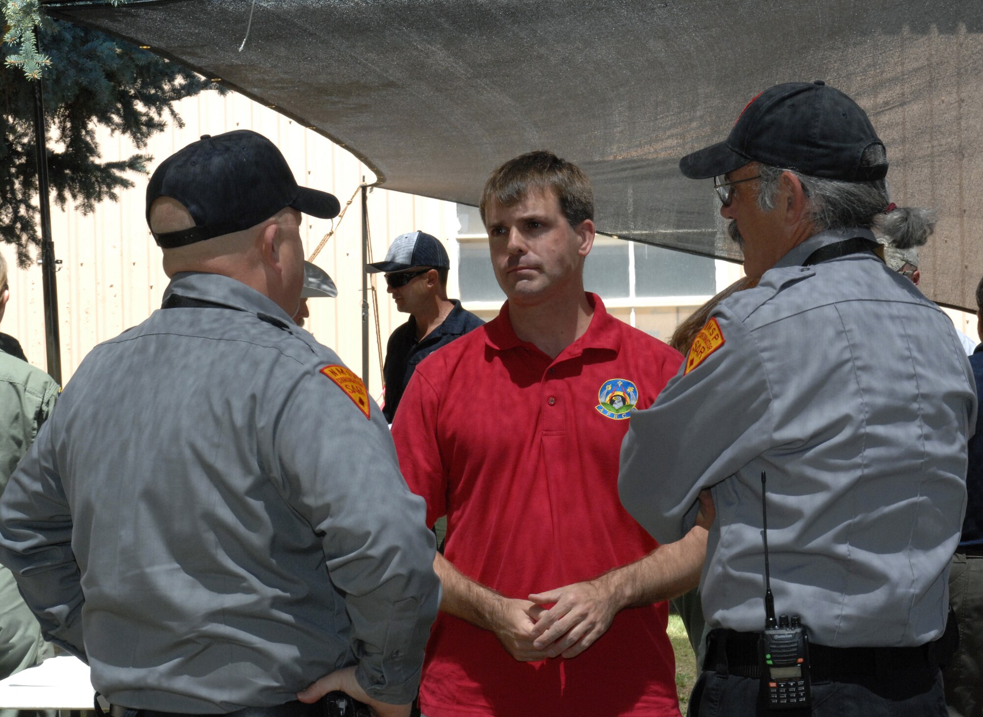 U.S. Air Force Lt. Col. Jameson Dugdale, Tyndall Air Force Base Air Force Rescue Coordination Center director of operations, speaks with members of the Arizona and New Mexico regional search and rescue community during an interagency meeting held at Grant Airport in Silver City, N.M. April 20, 2012. (U.S. Air Force photo by Airman 1st Class Saphfire Cook/Released)