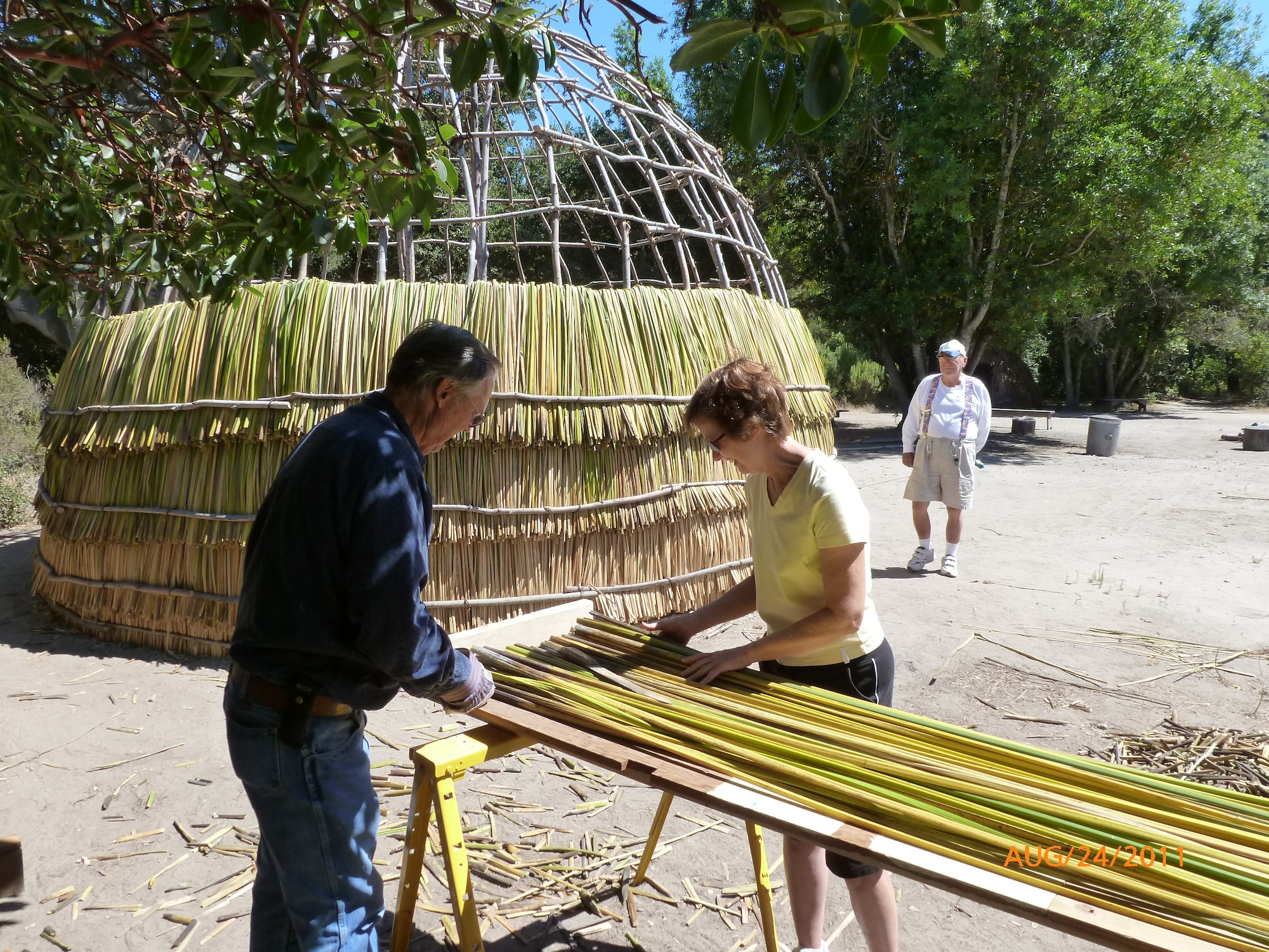 VANDENBERG AIR FORCE BASE, Calif. – Vandenberg archeologists and Mission La Purisma state park personnel help build a traditional Chumash Tule Hut at the La Purisma State Park. Vandenberg is home to more than 15 historic Native American villages. (Courtesy photo)