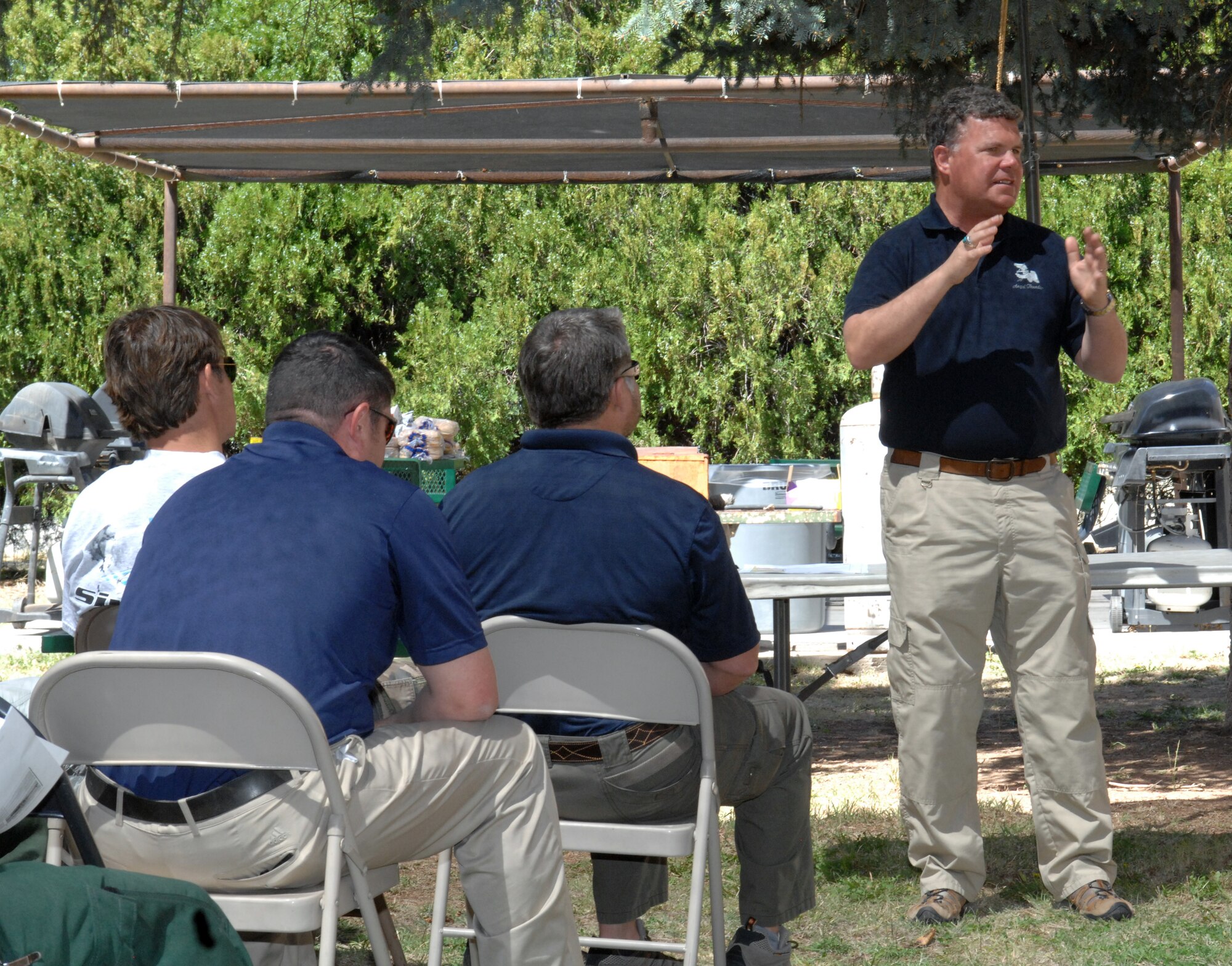 Mr. Brett Hartnett, director of the pararescue exercise Angel Thunder, speaks to civilian search and rescue factions during an interagency meeting held at Grant Airport in Silver City, N.M. April 20, 2012. The meeting was a means to inform local groups of D-M’s search and rescue capabilities and how to request assistance if needed. (U.S. Air Force photo by Airman 1st Class Saphfire Cook/Released)