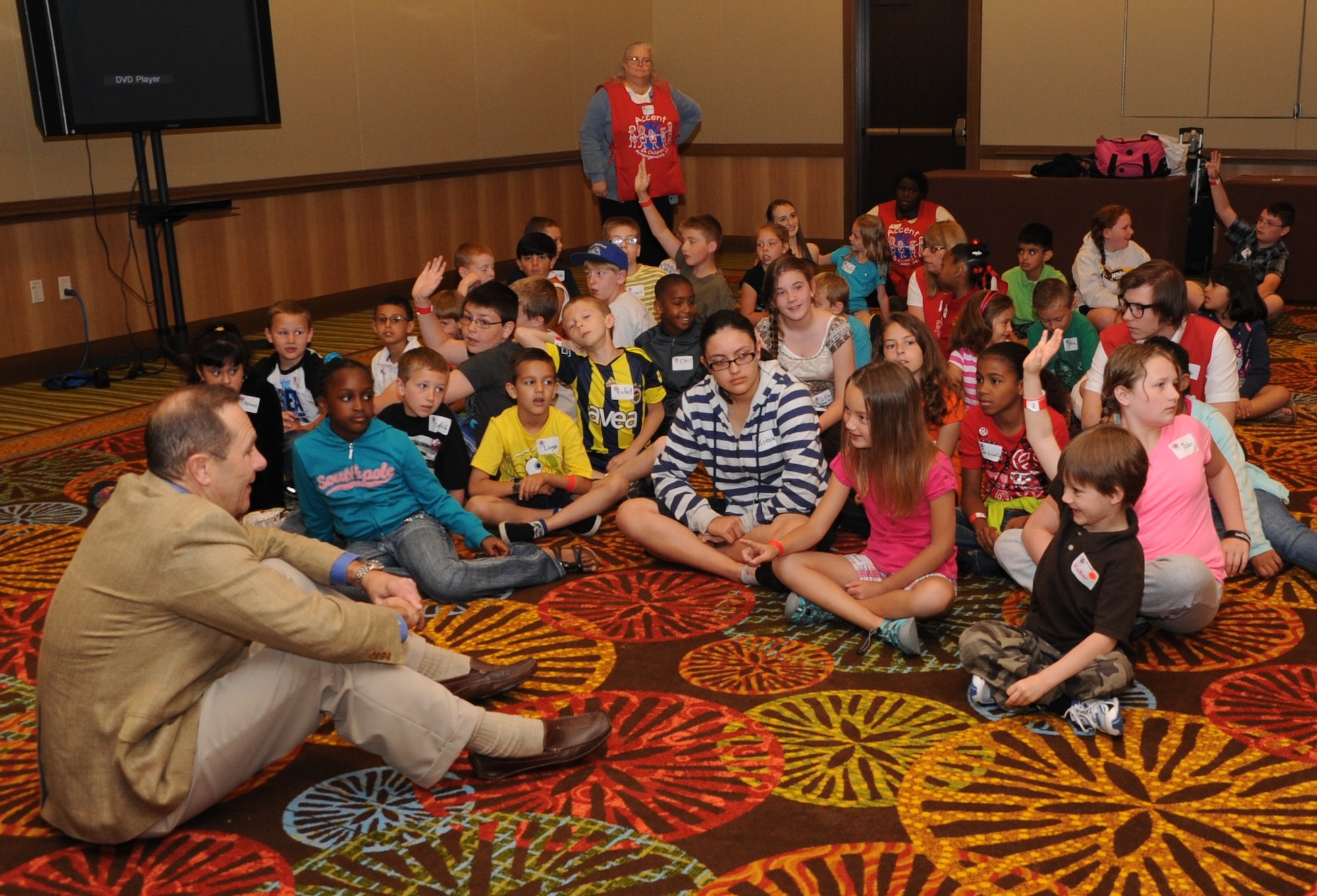 Brig. Gen. Norman Ham, commander, commander of the 440th Airlift Wing, an Air Force Reserve Wing at Pope Field, N.C., speaks to Reserve-dependent children at Air Force Reserve Command’s Yellow Ribbon event in Orlando, Fla., April 29. Ham spoke to the children, ages 6-12, about the Air Force Reserve, deployments and more, and answered their related questions. (U.S. Air Force photo/Staff Sgt. Anna-Marie Wyant)