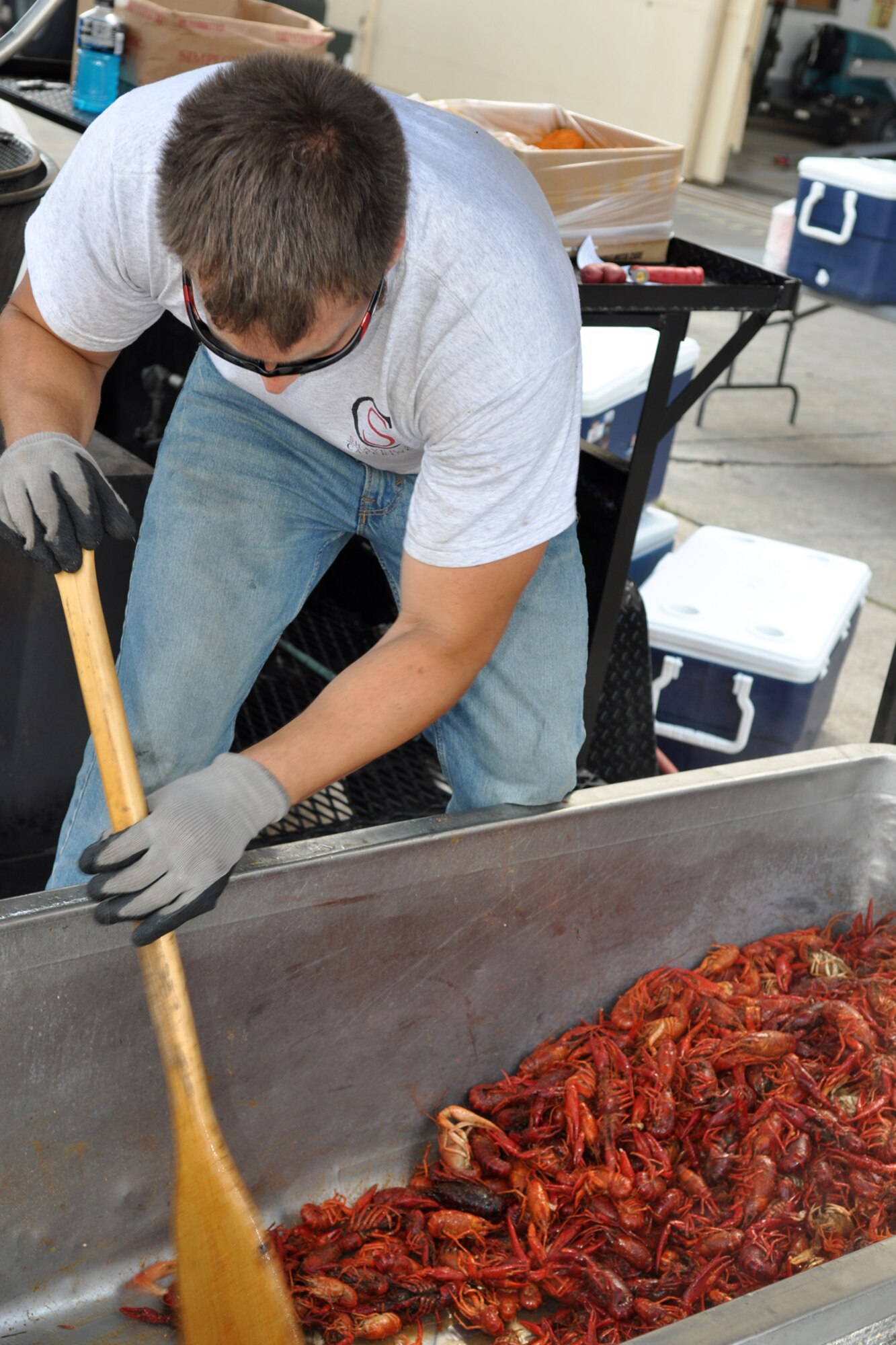 Jake Shaver, with Shaver’s Catering in Shreveport, La., prepares a load of boiled crawfish for a luncheon at the A-10 Hangar at Barksdale Air Force Base, La., April 30, 2012. The luncheon, which was held for Airmen from the 307th Bomb Wing and 917th Fighter Group, was sponsored by Mr. Boyd Parker and Shreveport Rubber and Gasket Company in “appreciation for what Barksdale Air Force Base does for the freedom we enjoy.” (U.S. Air Force photo by Betty Stephens) 