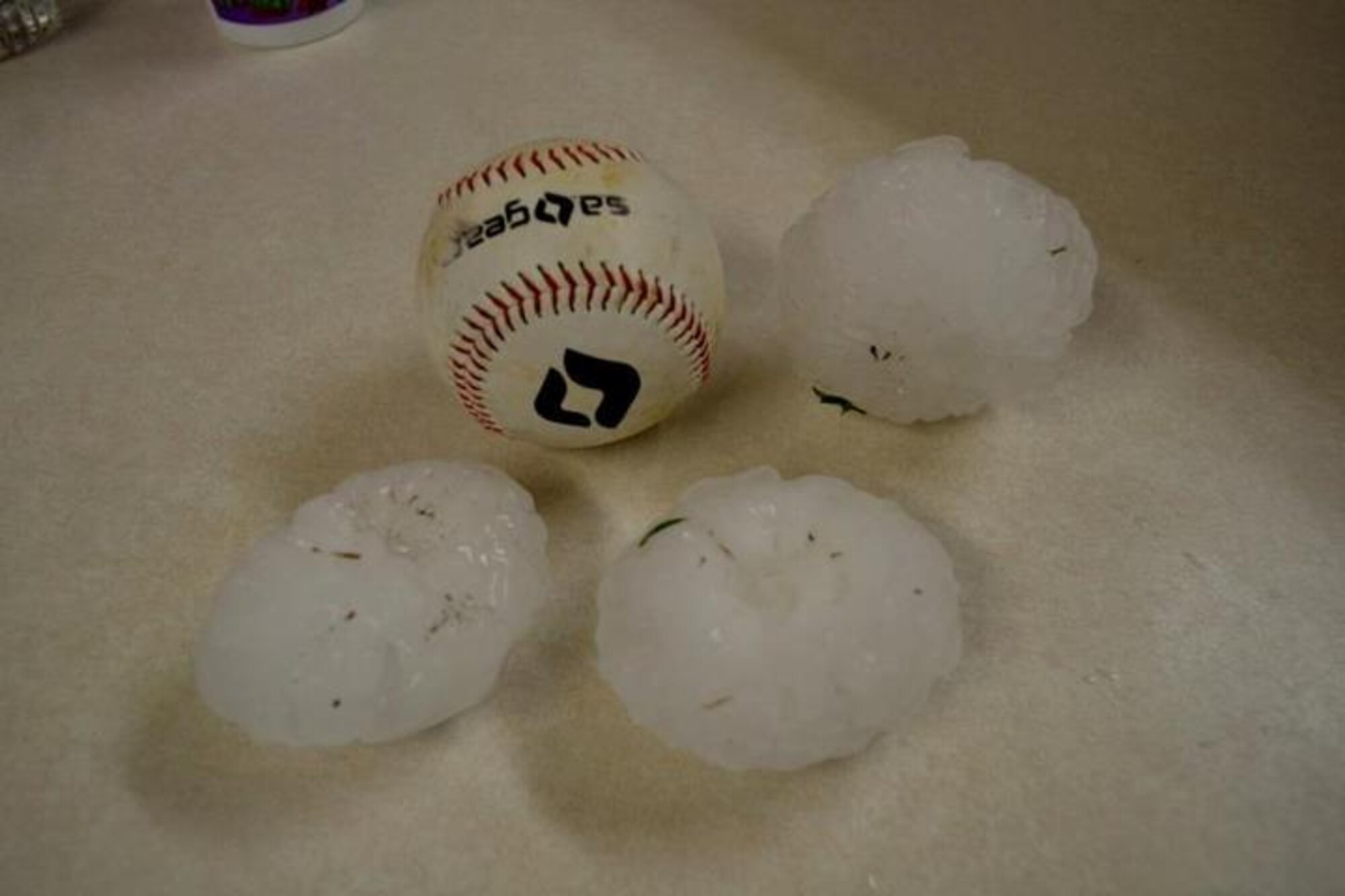 Near baseball sized hail pounded Scott AFB April 28, 2012. The AtHoc systen, which generates alerts using the Internet Protocol Addresses as an installation-wide, mass-notification system was put to the test this weekend after a severe thunderstom. (Courtesy photo)